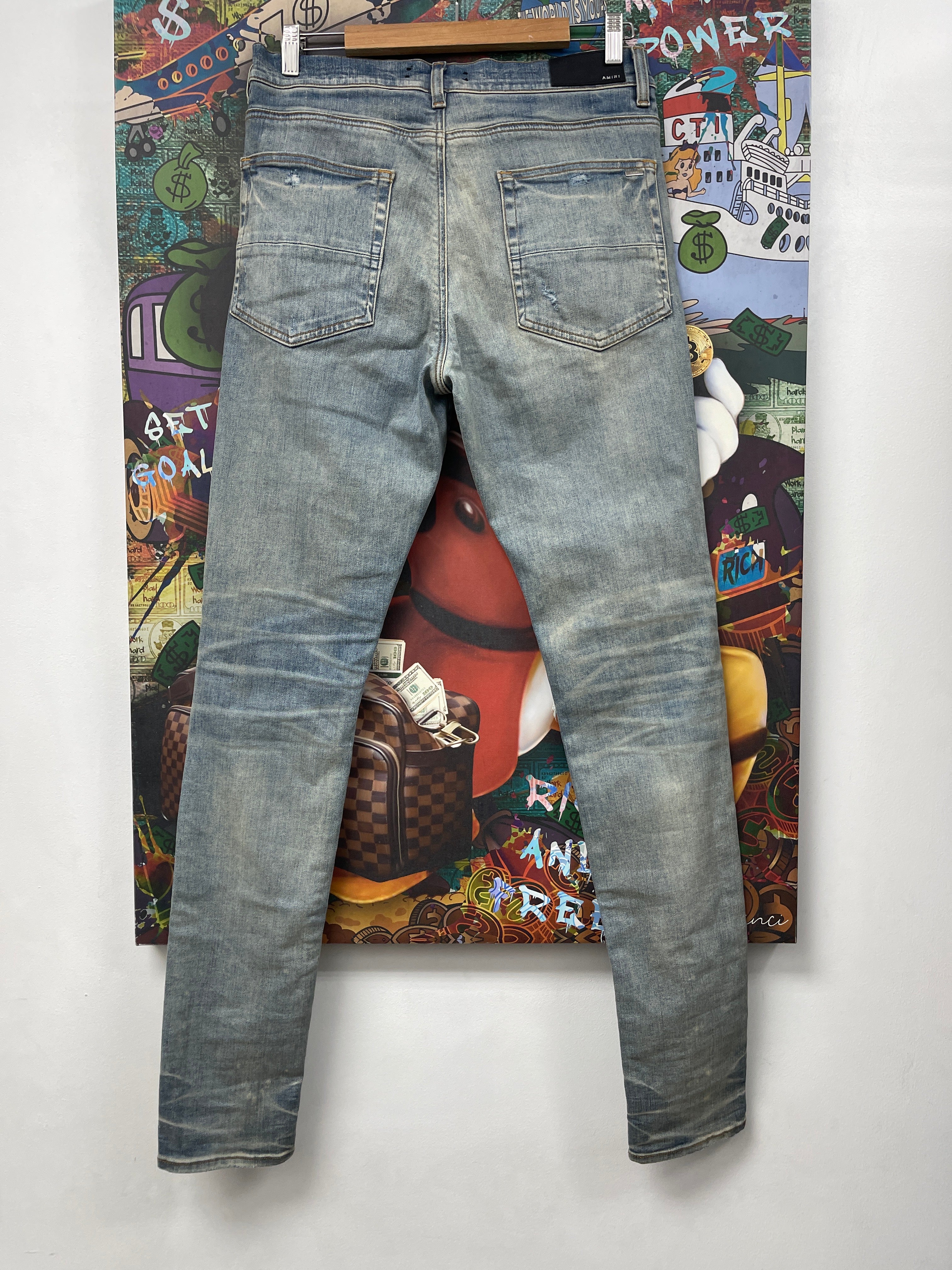 Amiri Light Wash Blue Green Paisley Thrasher Patch Jeans