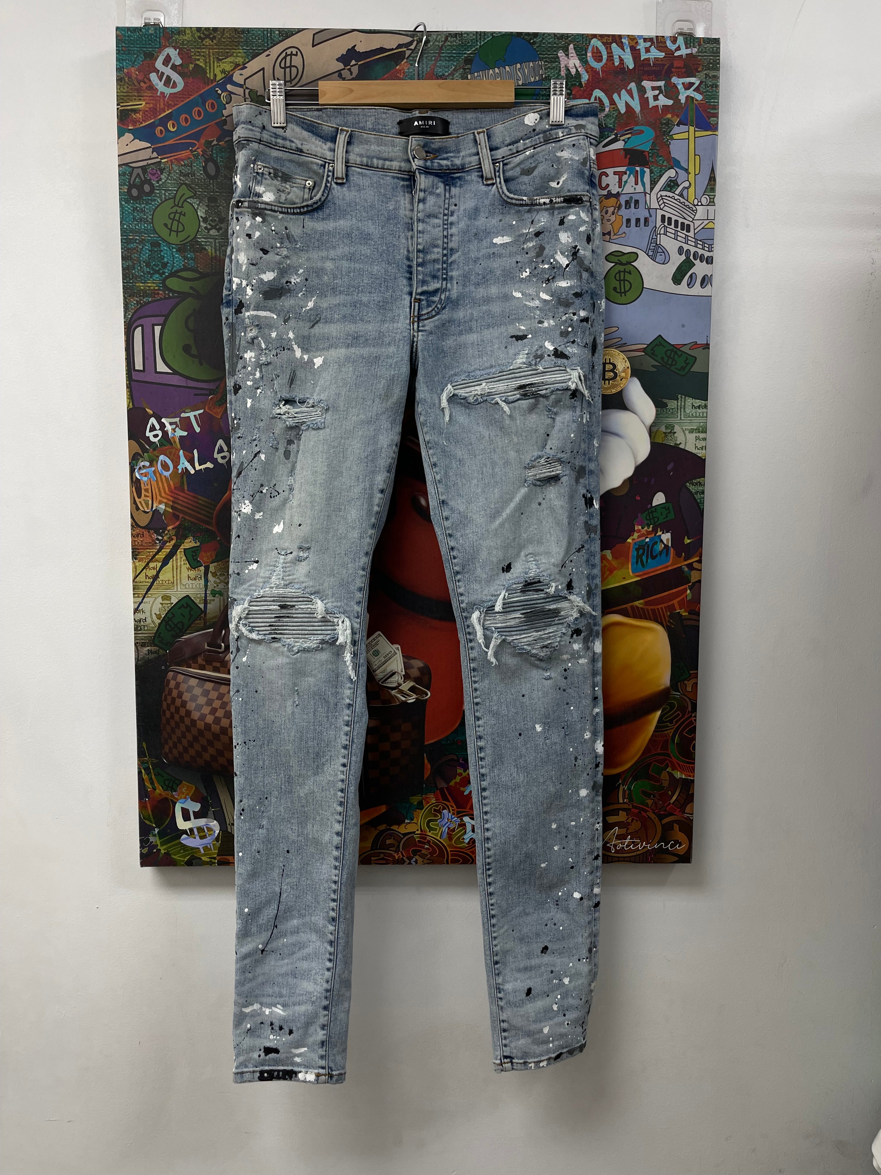 Amiri MX1 Light Wash Denim Splatter Patch Jeans