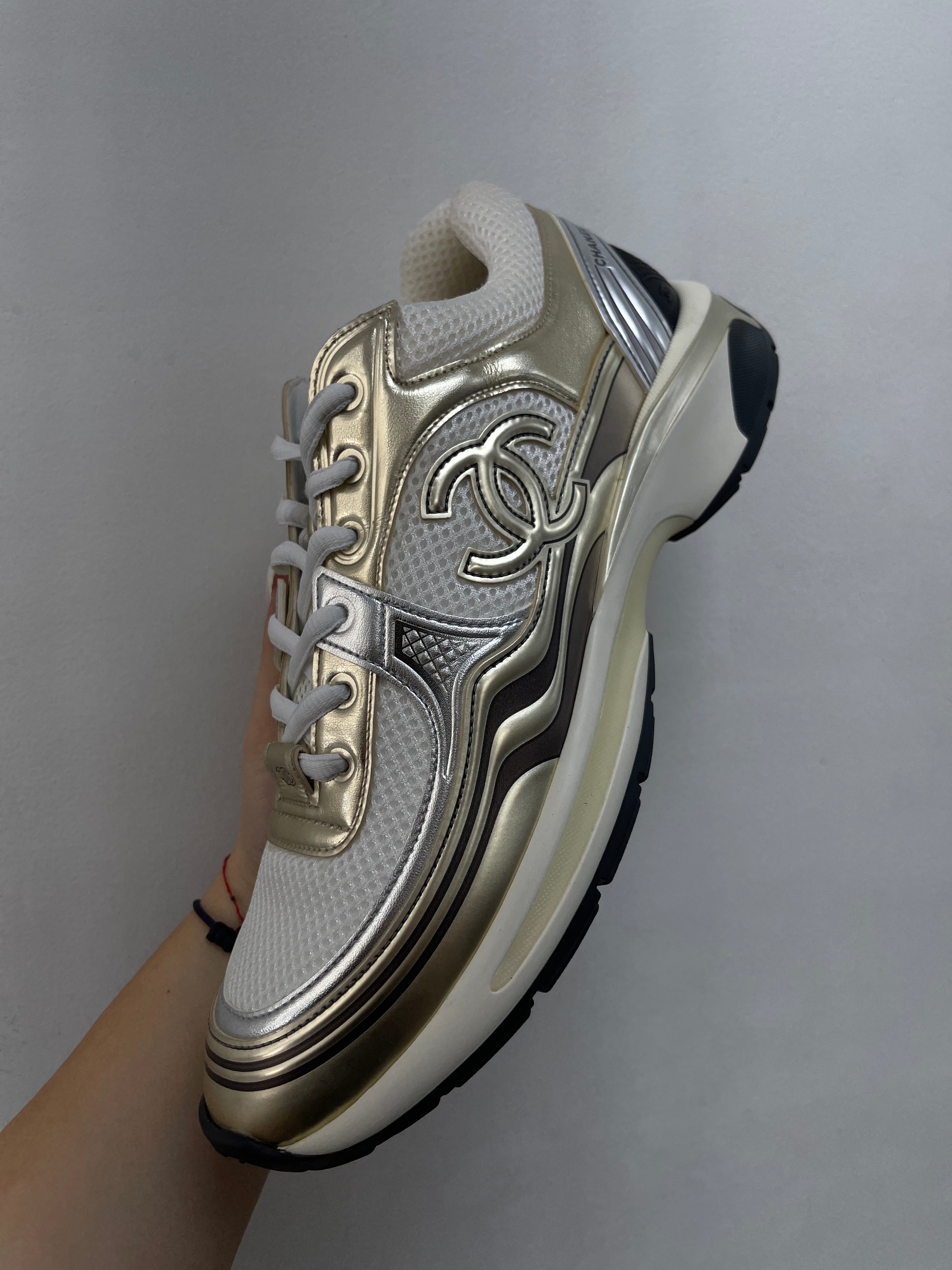 Chanel Gold Metallic CC Runner Sneakers