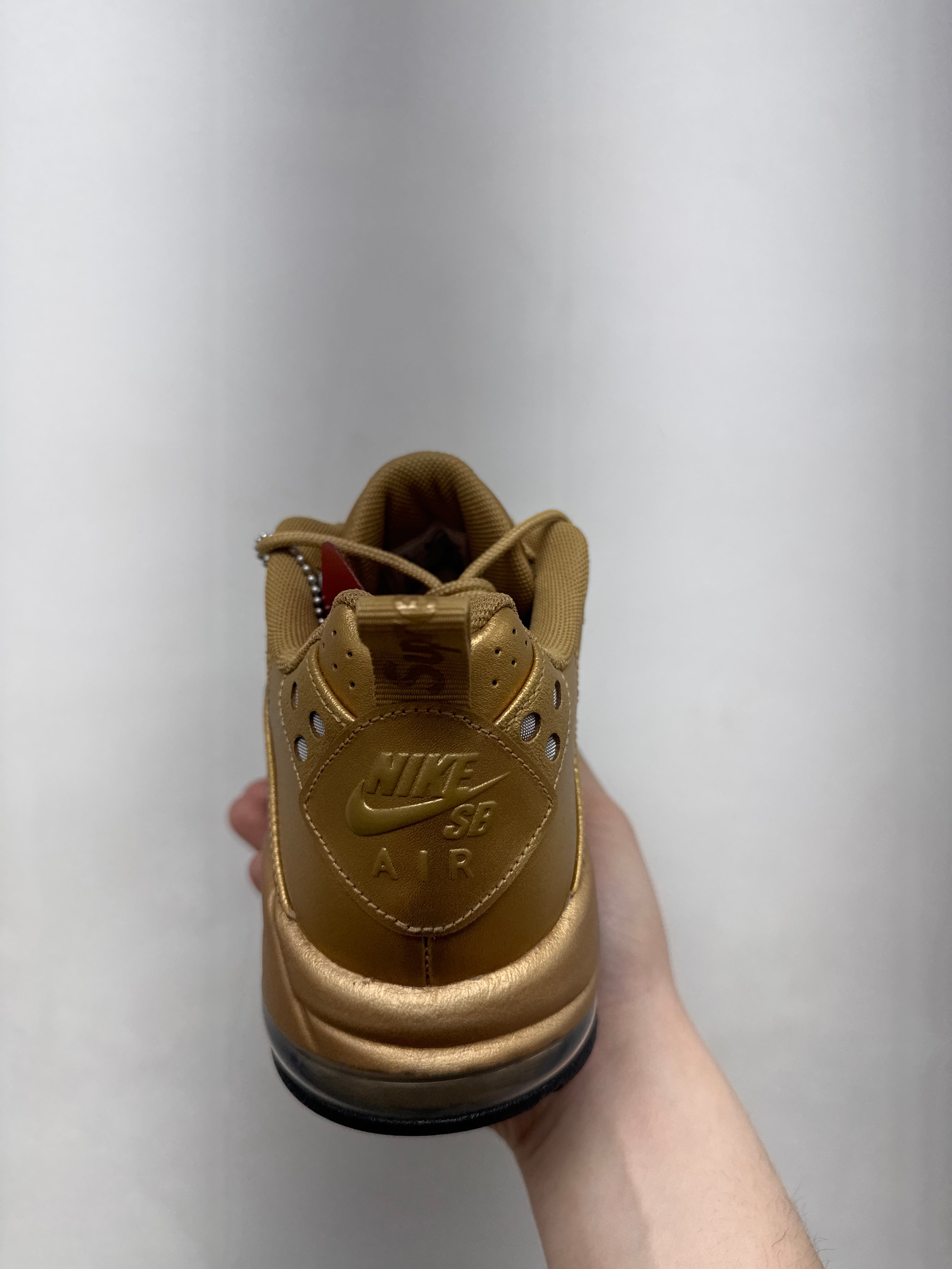 Nike Supreme CB94 Low Gold Metallic Sneakers
