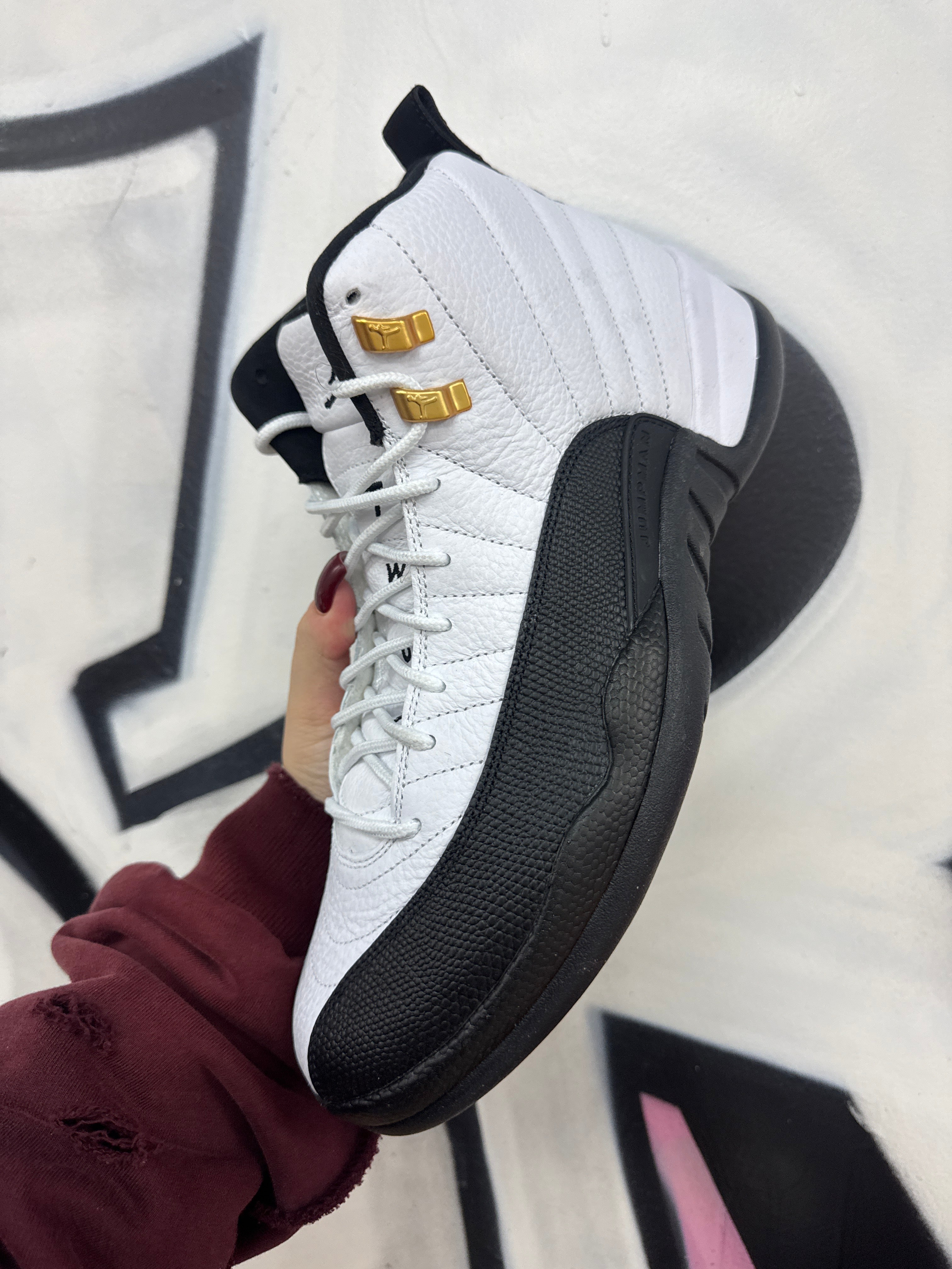 Nike Jordan 12 Taxi Sneakers