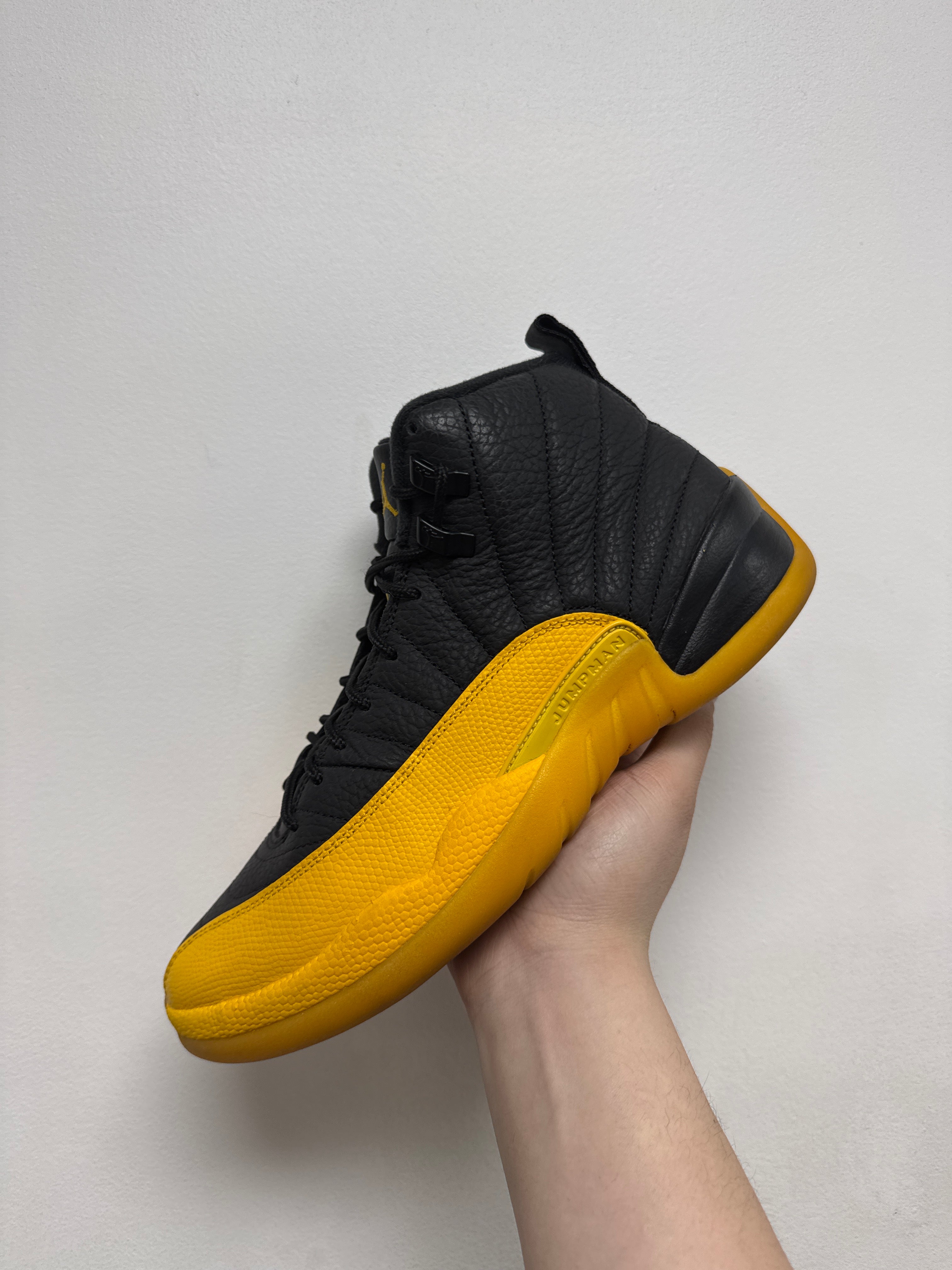 Jordan 12 University Gold Sneakers