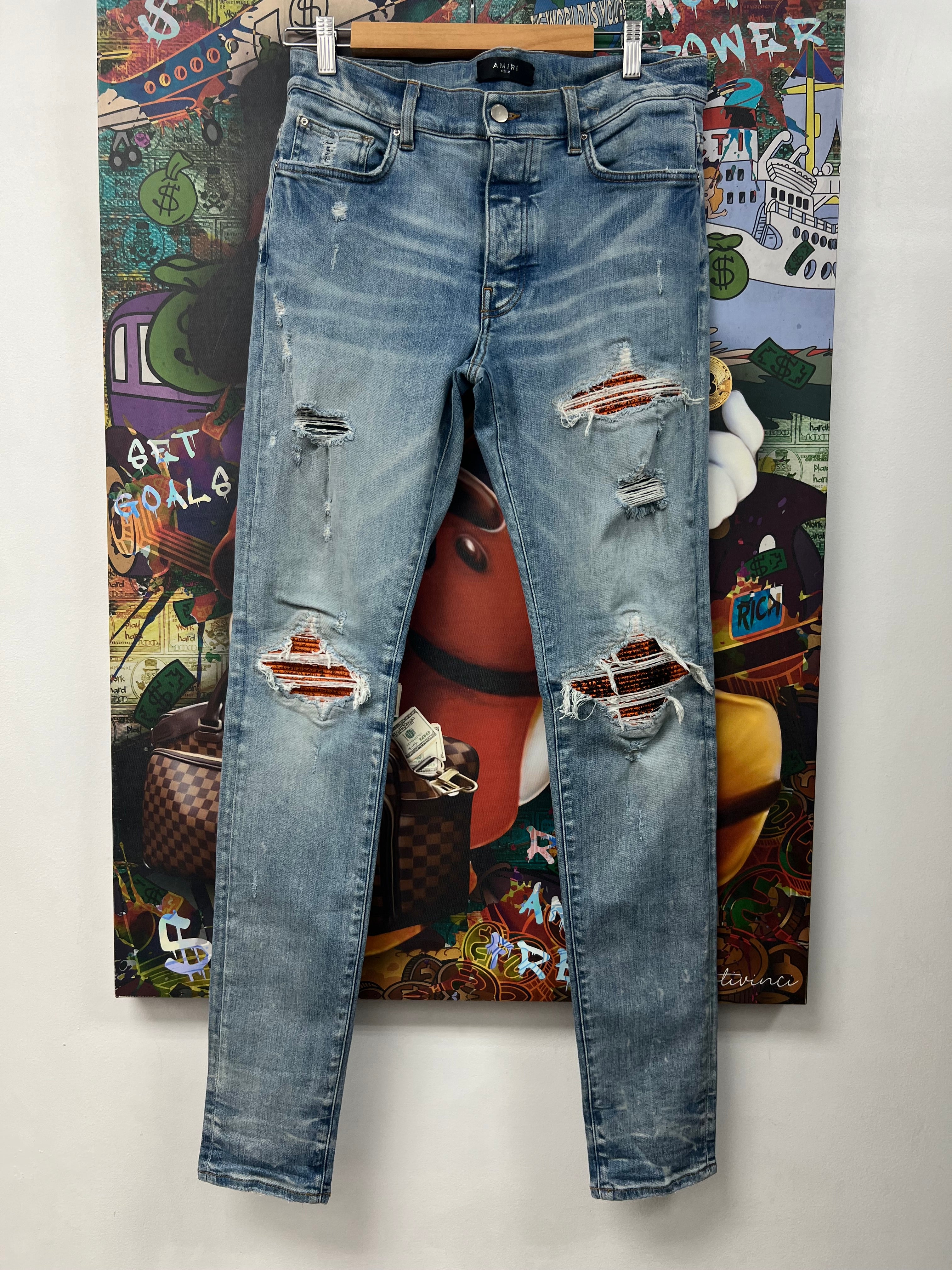 Amiri MX1 Light Wash Orange Crackle Jeans