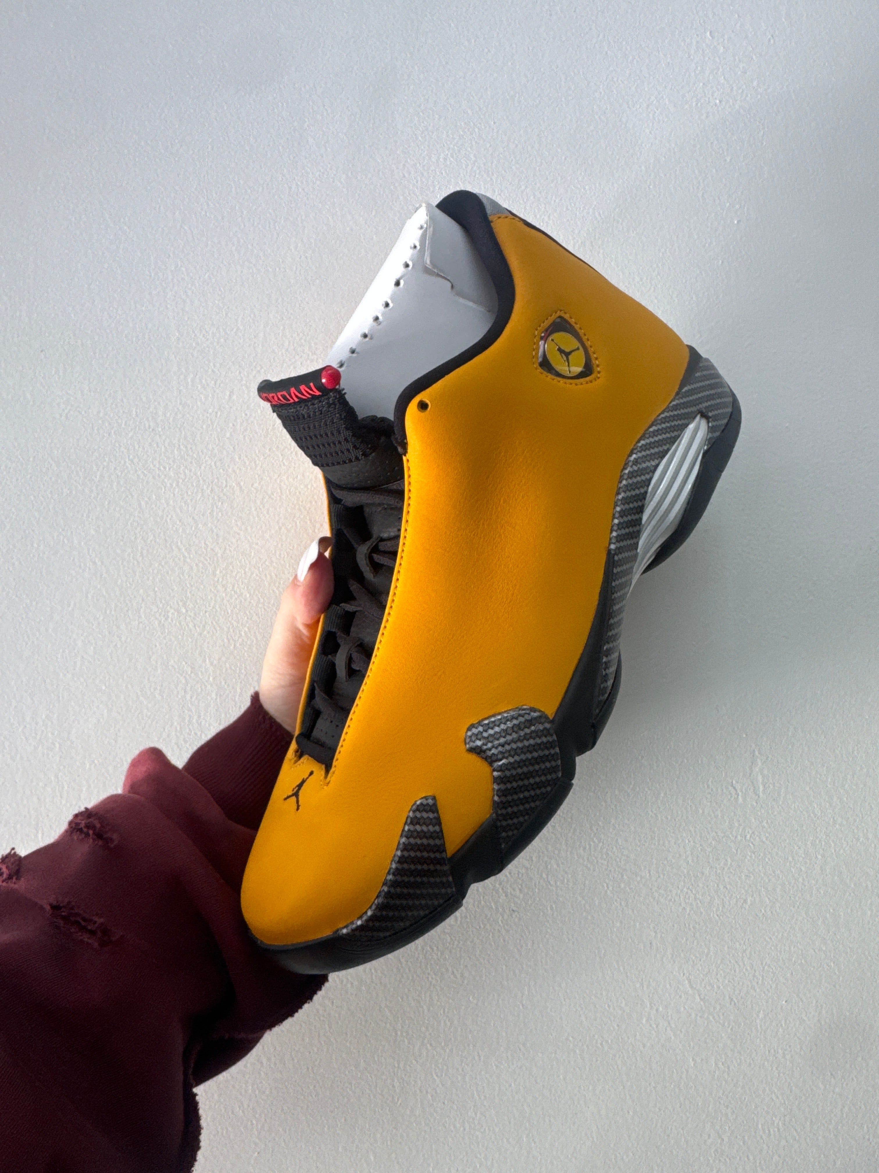 Nike Jordan 14 University Gold Sneakers