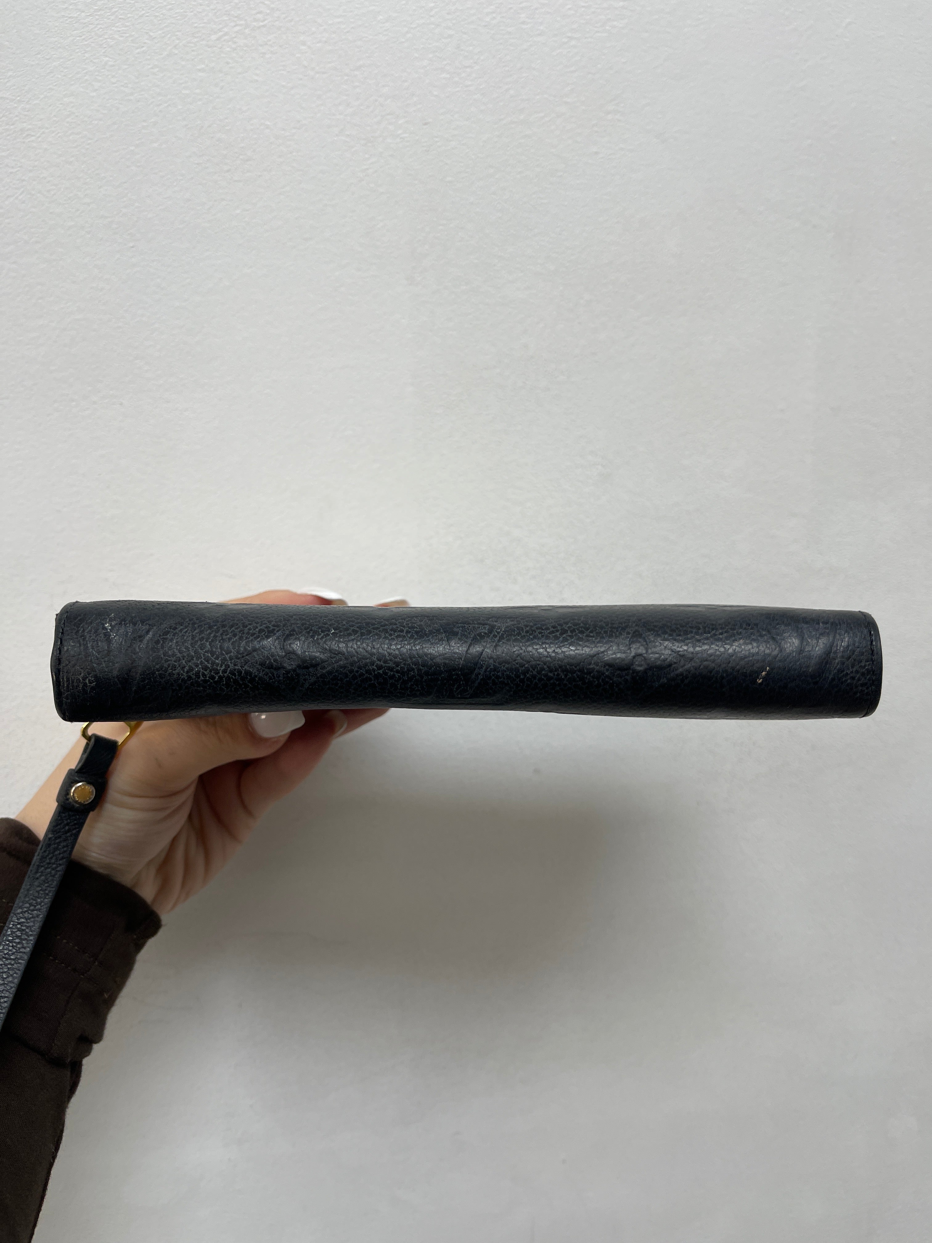 Louis Vuitton Embossed Monogram Zippy Wallet