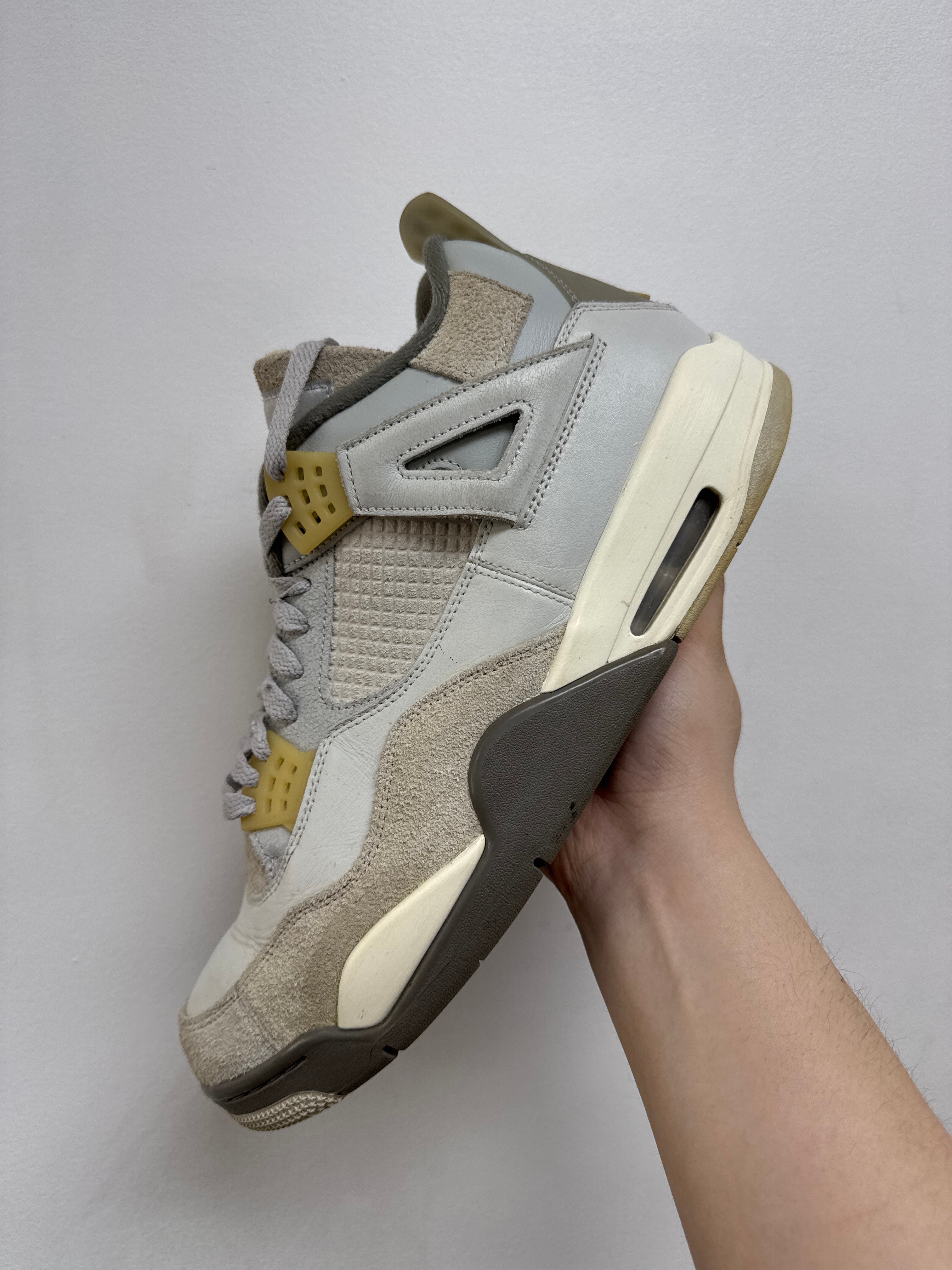 Jordan 4 Photon Dust Sneakers