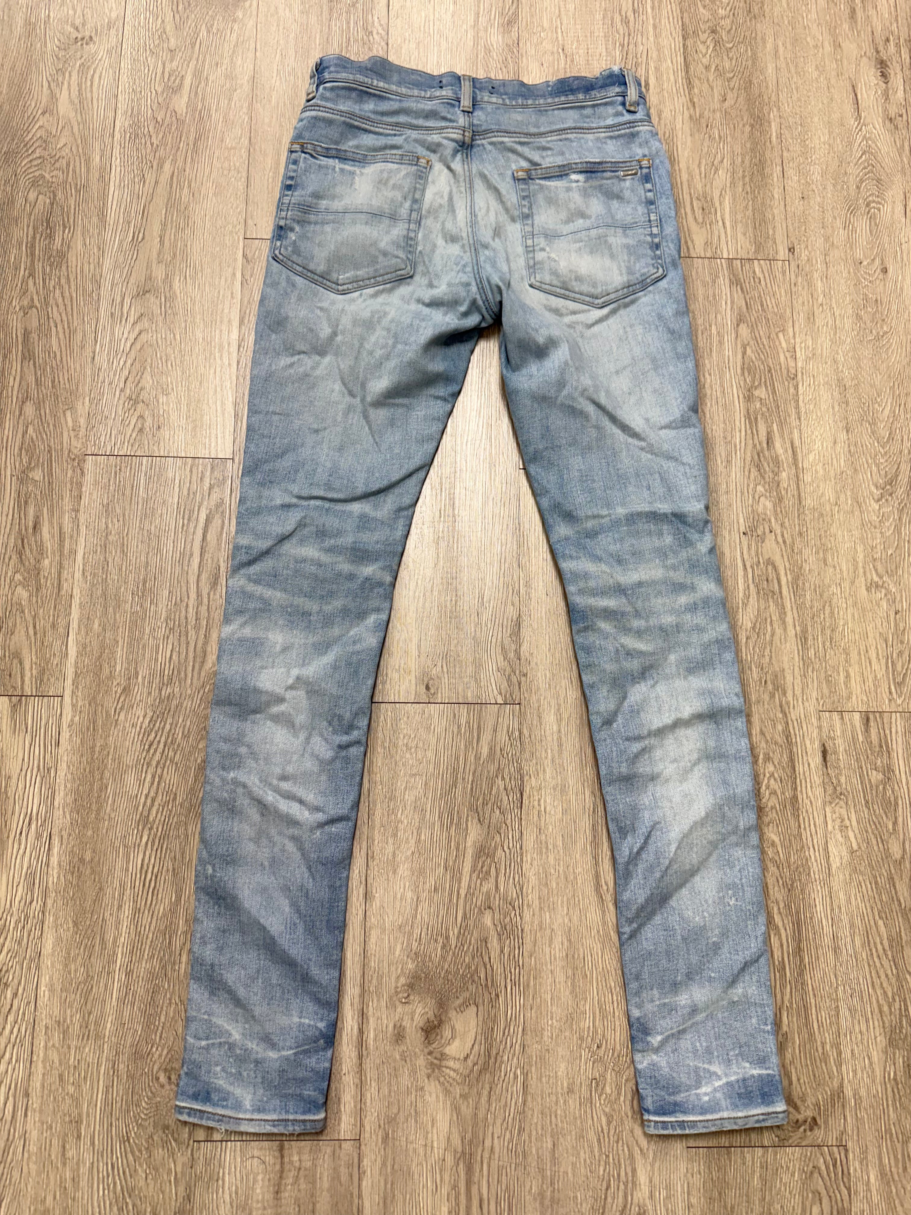 Amiri MX1 Light Wash Marble Patch Jeans