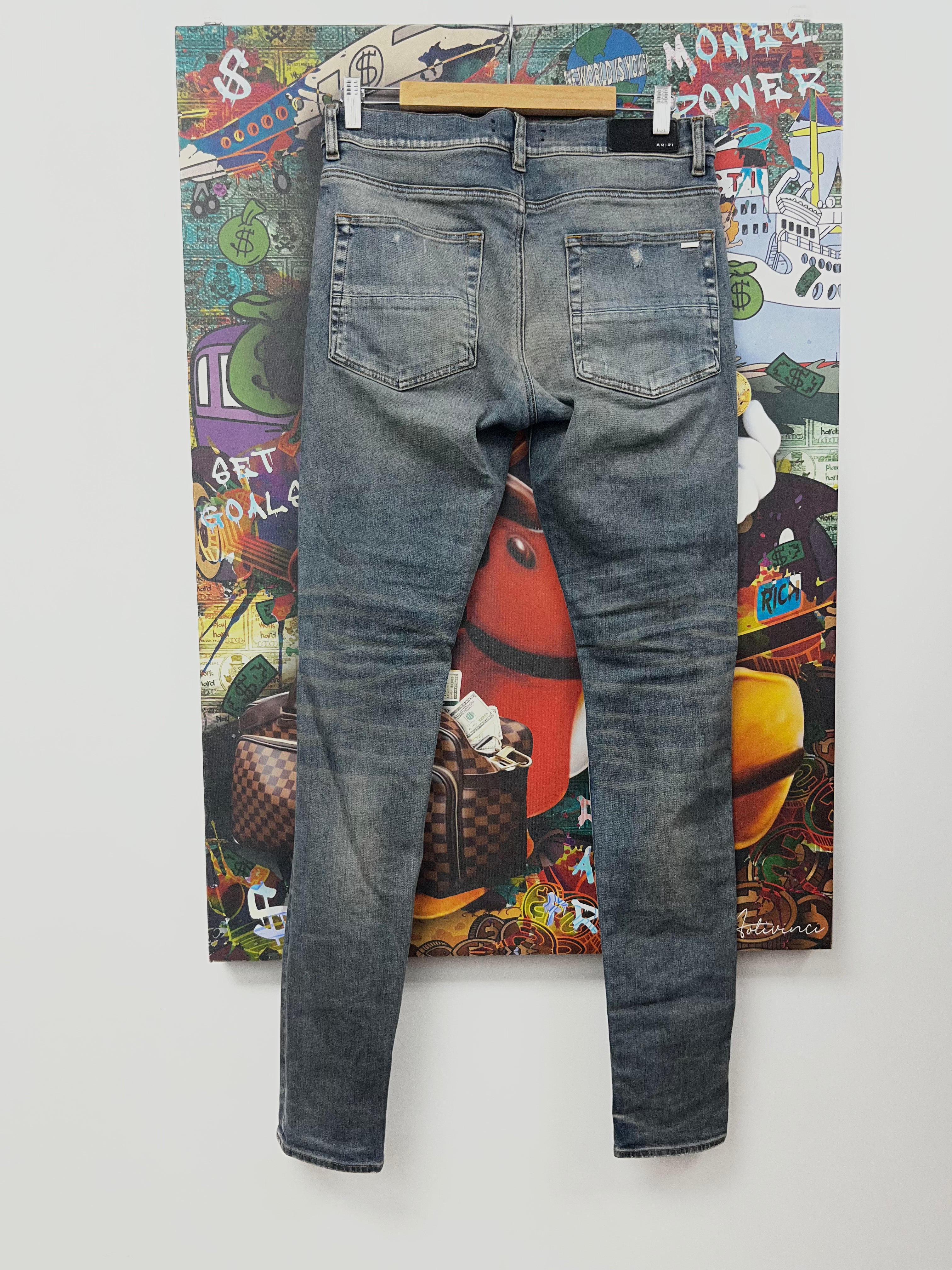 Amiri Dark Indigo Rust Leather Thrasher Patch Jeans