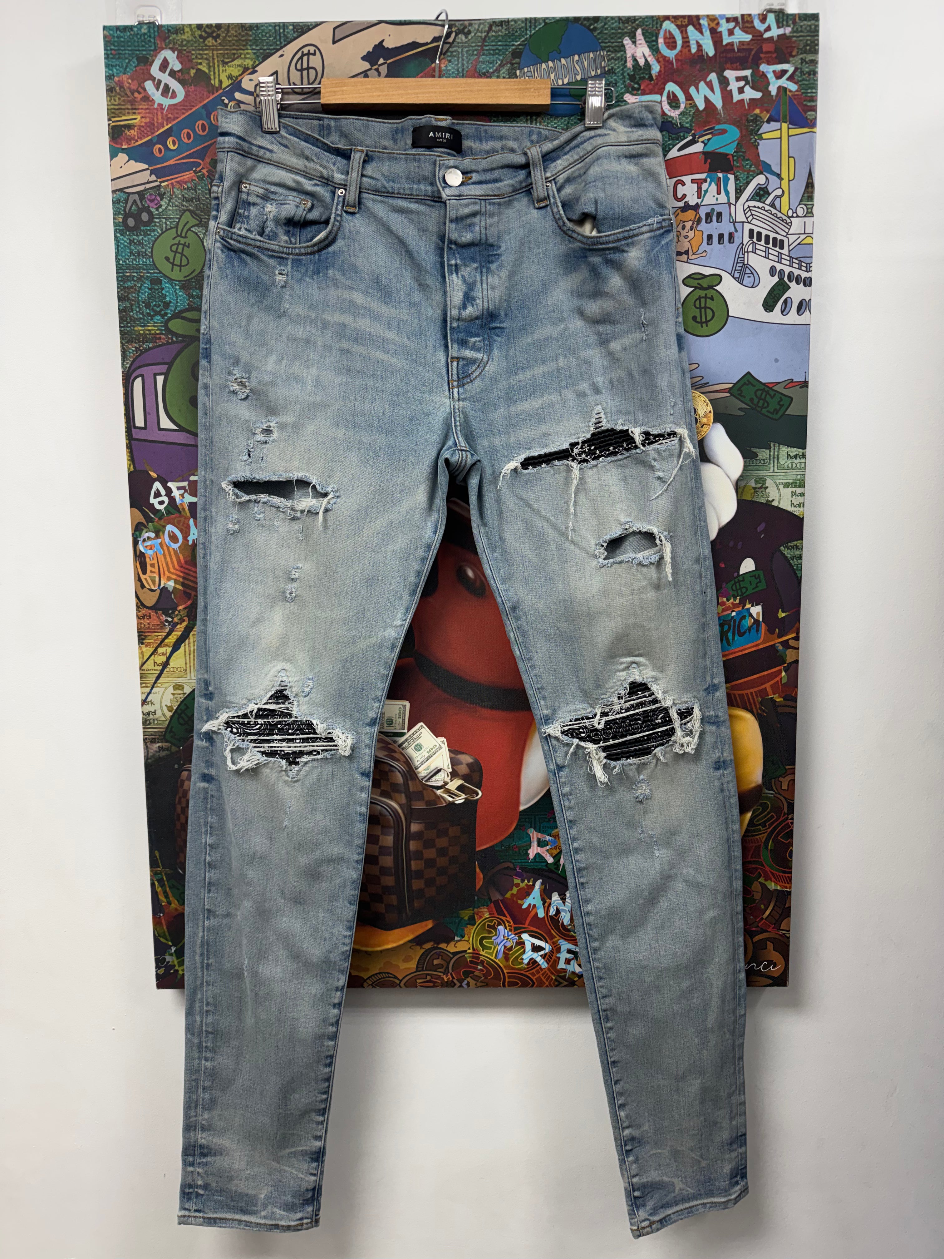 Amiri MX1 Light Wash Black Paisley Patch Jeans