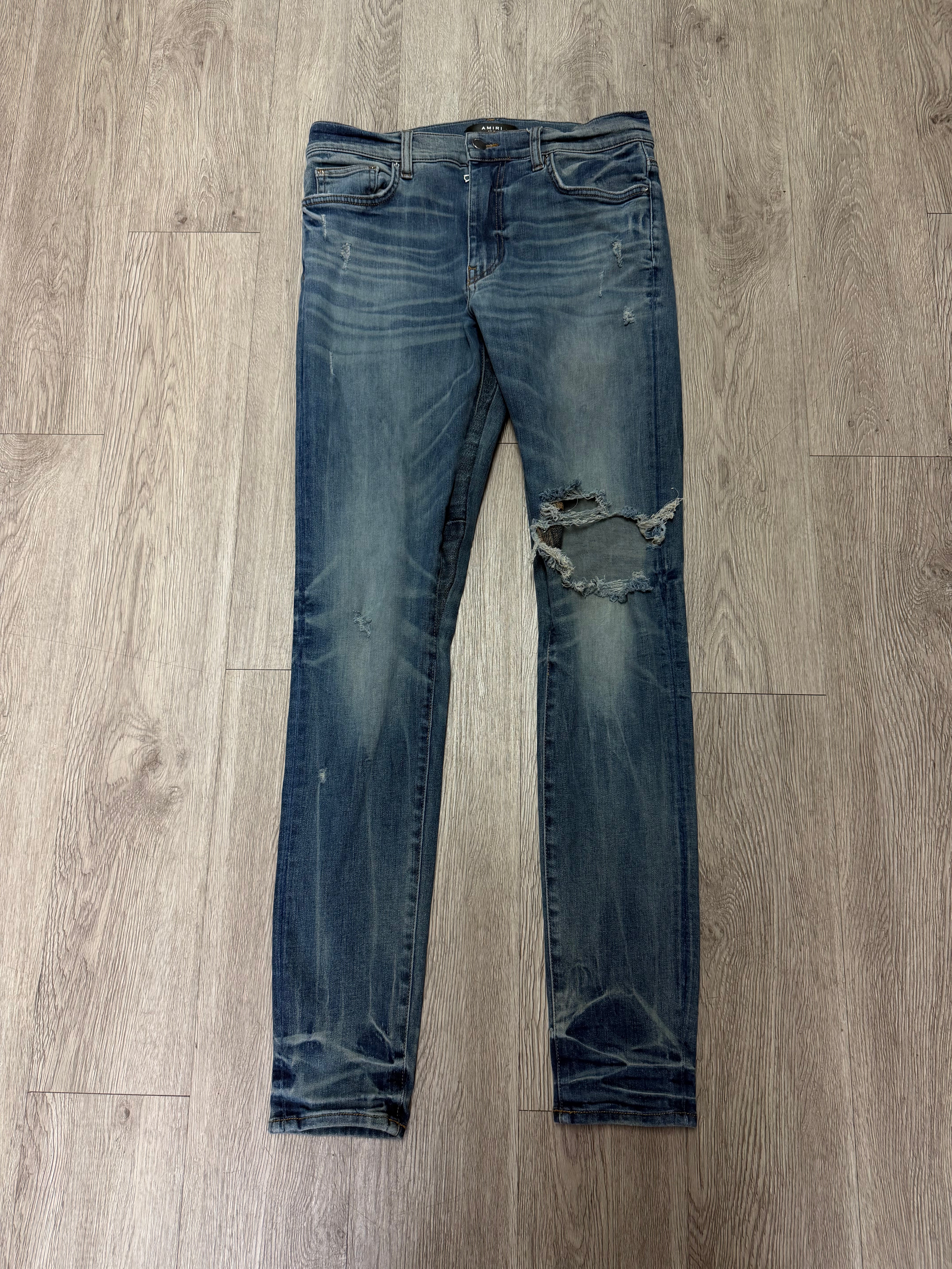 Amiri Light Wash Knee Rip (Zipper) Jeans
