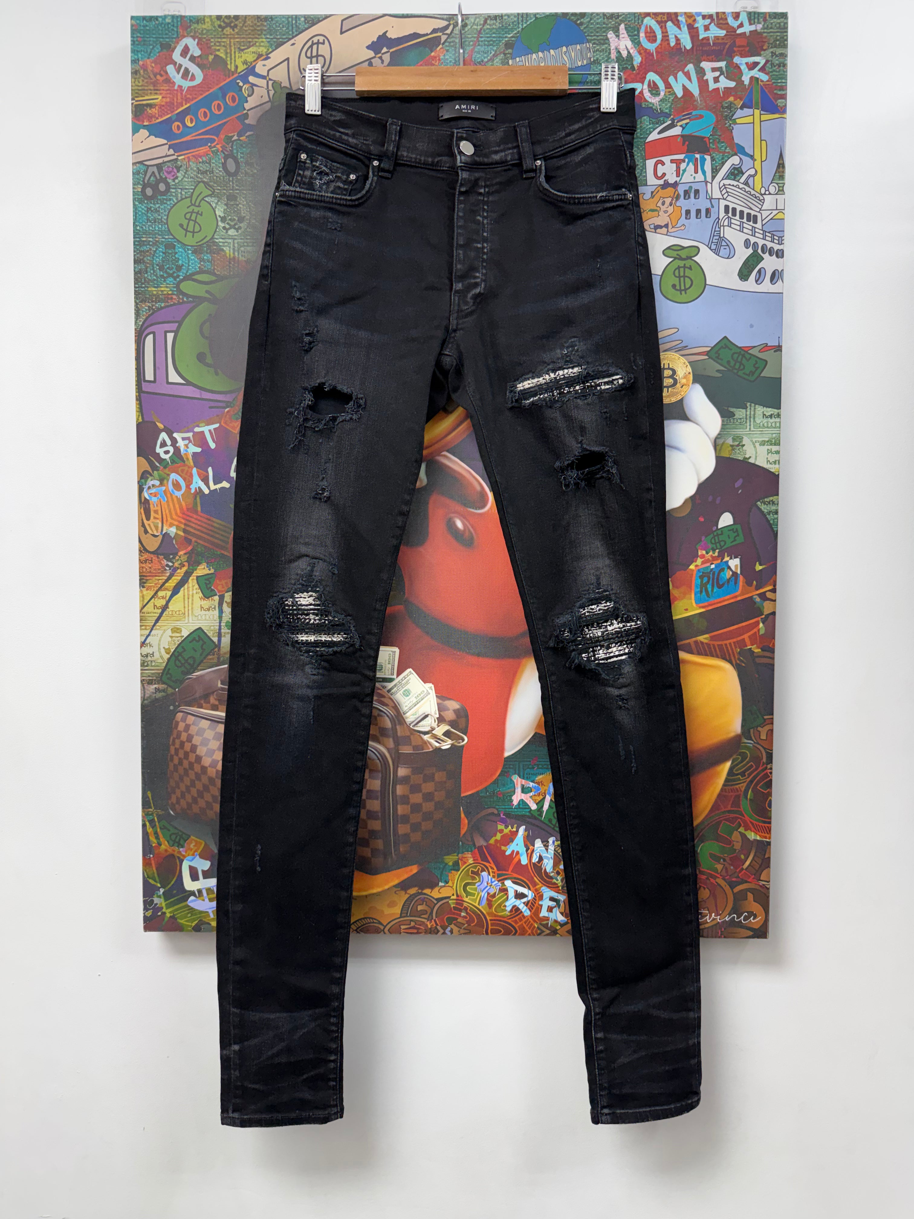 Amiri MX1 Black Wash Boucle Patch Jeans