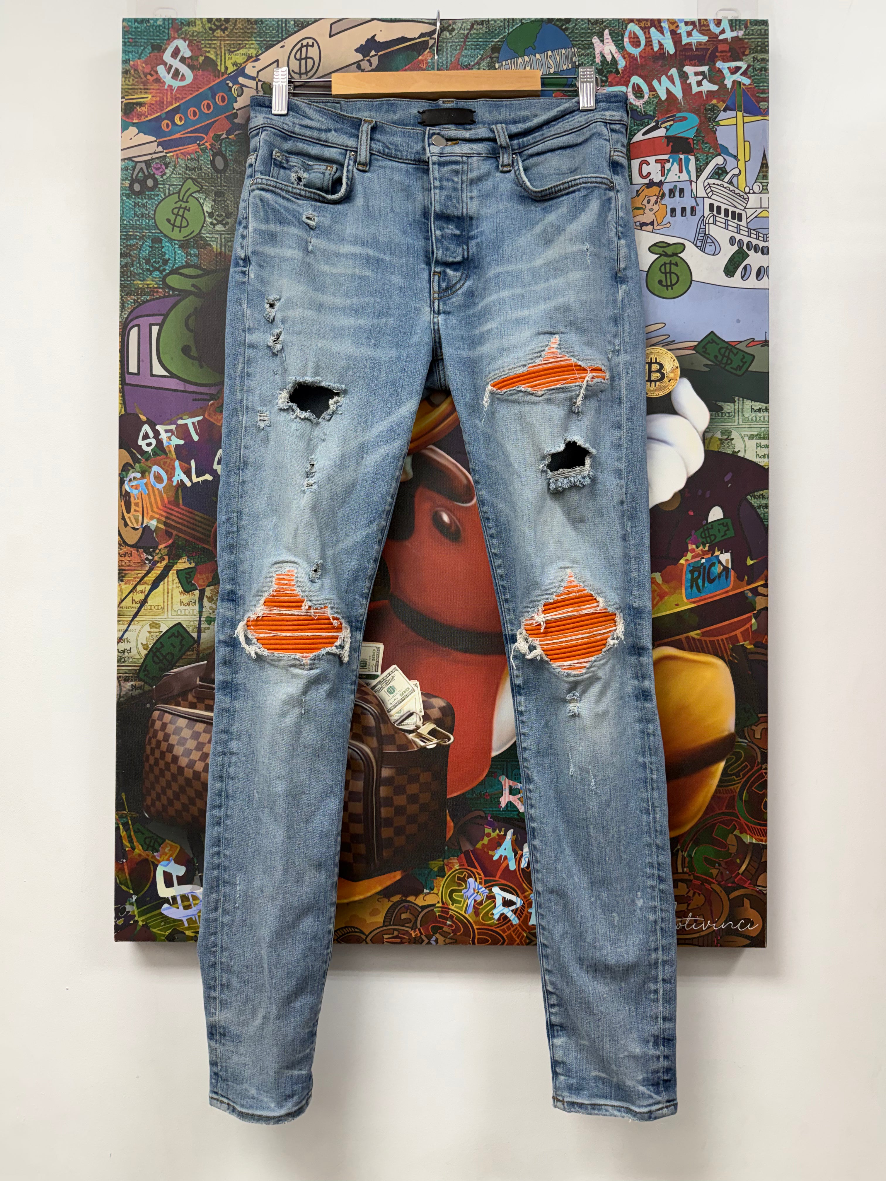 Amiri MX1 Light Wash Orange Suede Patch Jeans