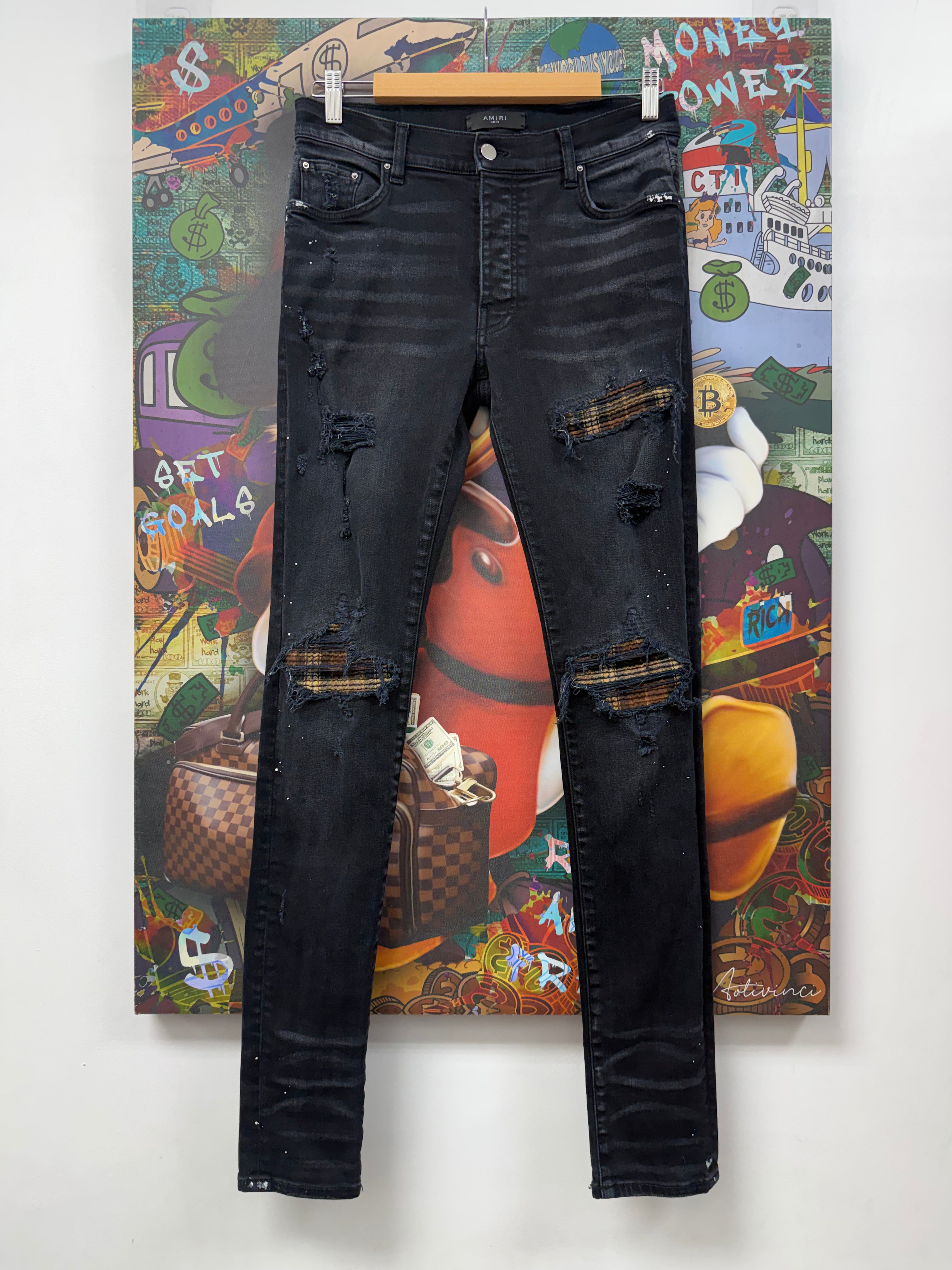 Amiri MX1 Black Wash Brown Plaid Patch Jeans