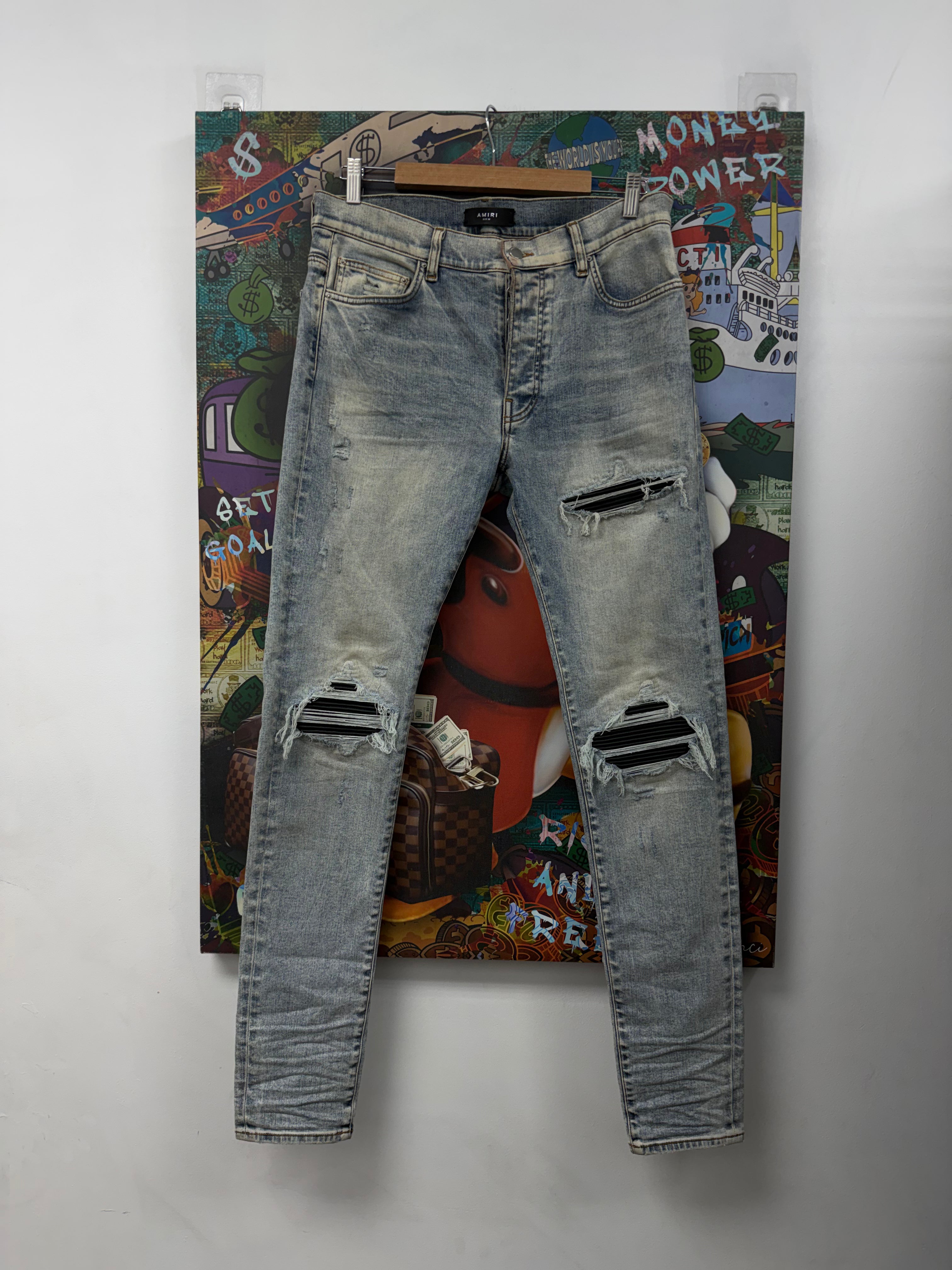 Amiri MX1 Stone Wash Black Leather Patch Jeans