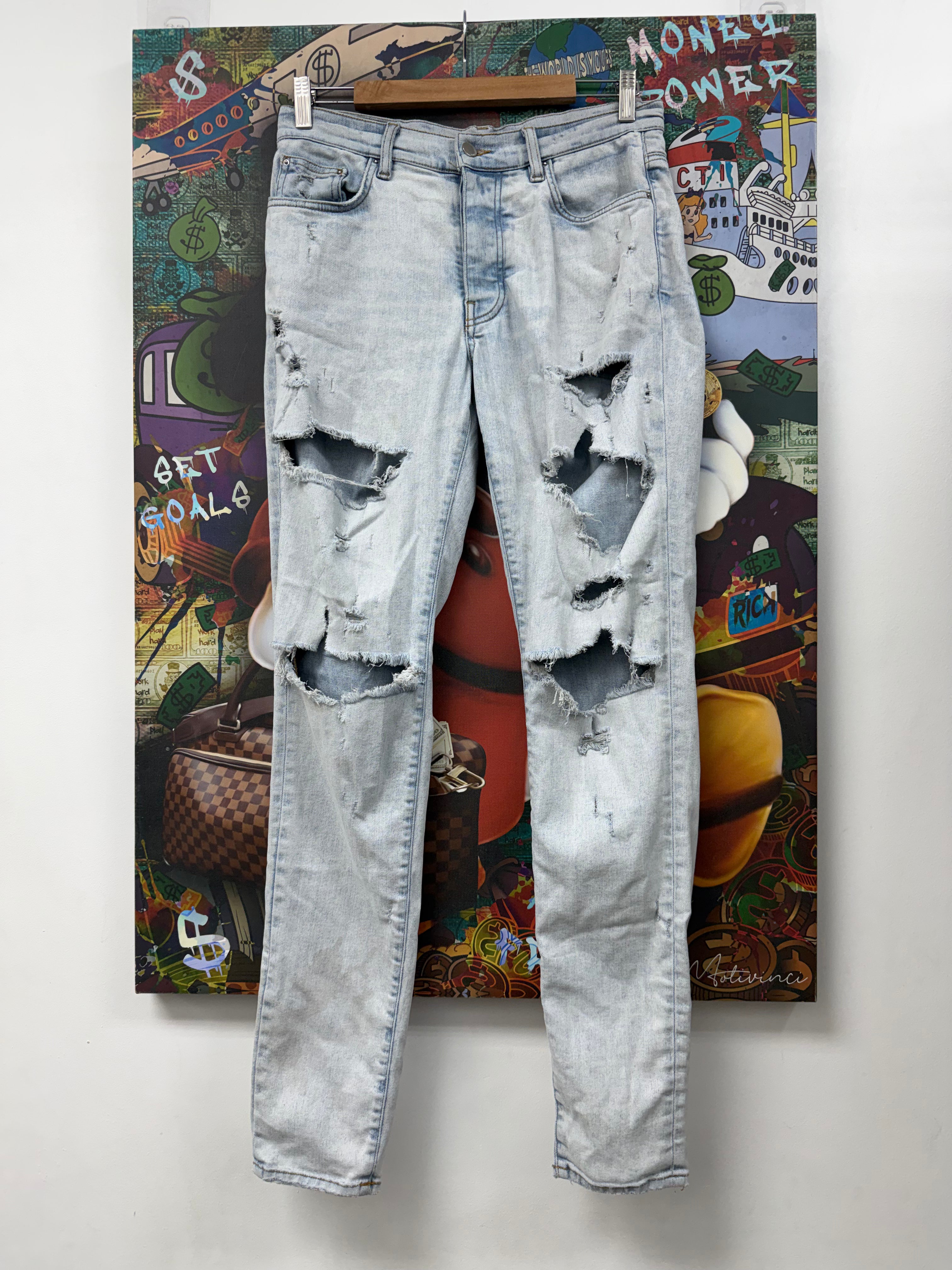 Amiri Light Wash Plain Thrasher Ripped Jeans