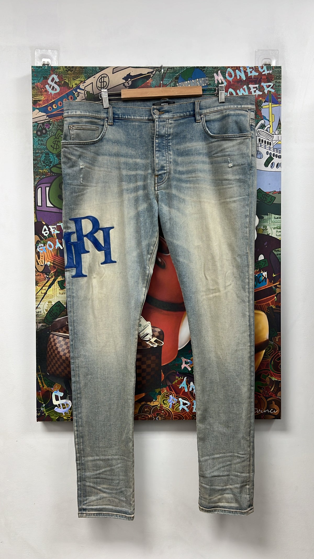 Amiri Light Wash Blue Staggered Side Logo Jeans