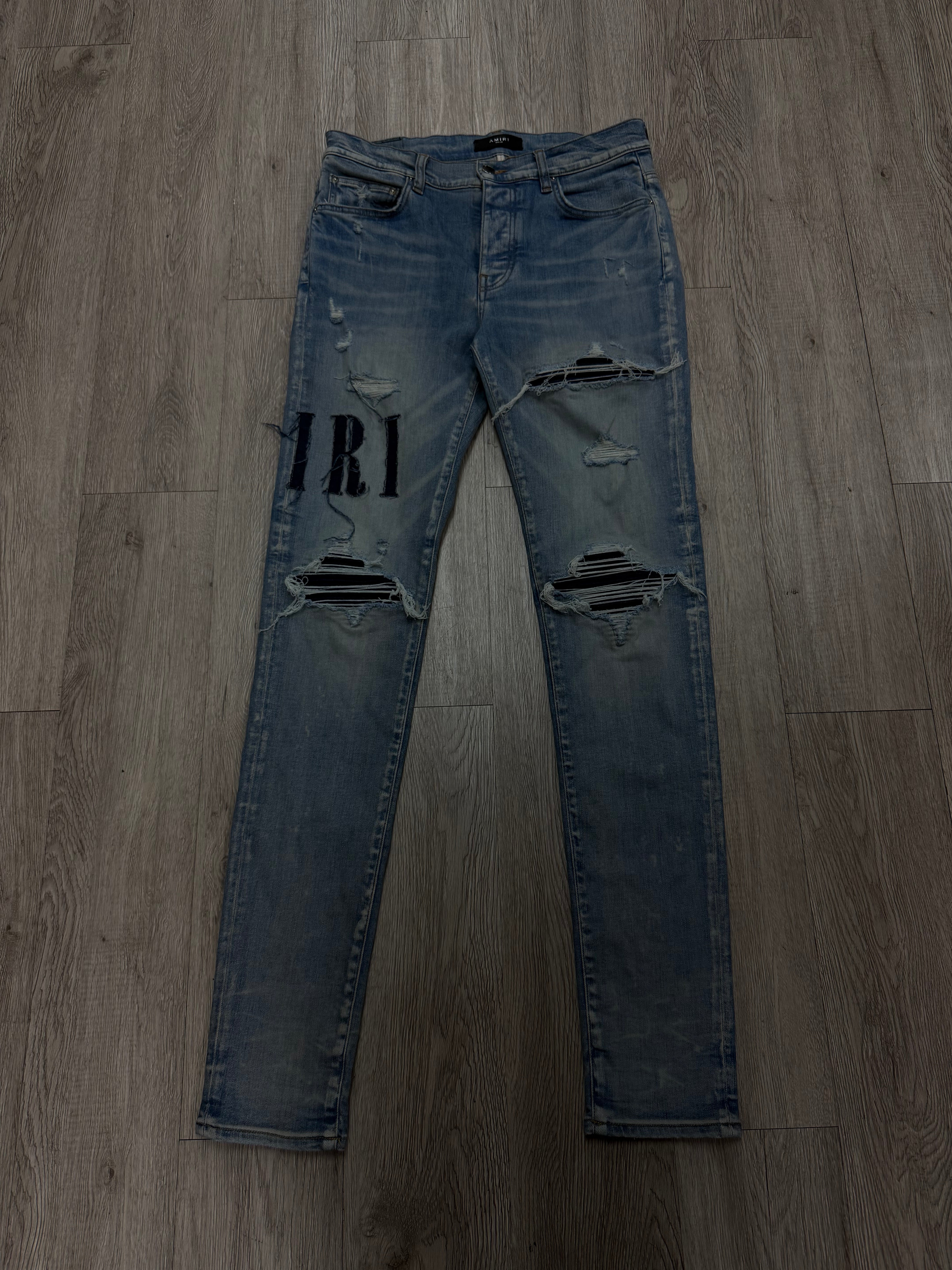 Amiri Light Wash Denim Side Logo Jeans