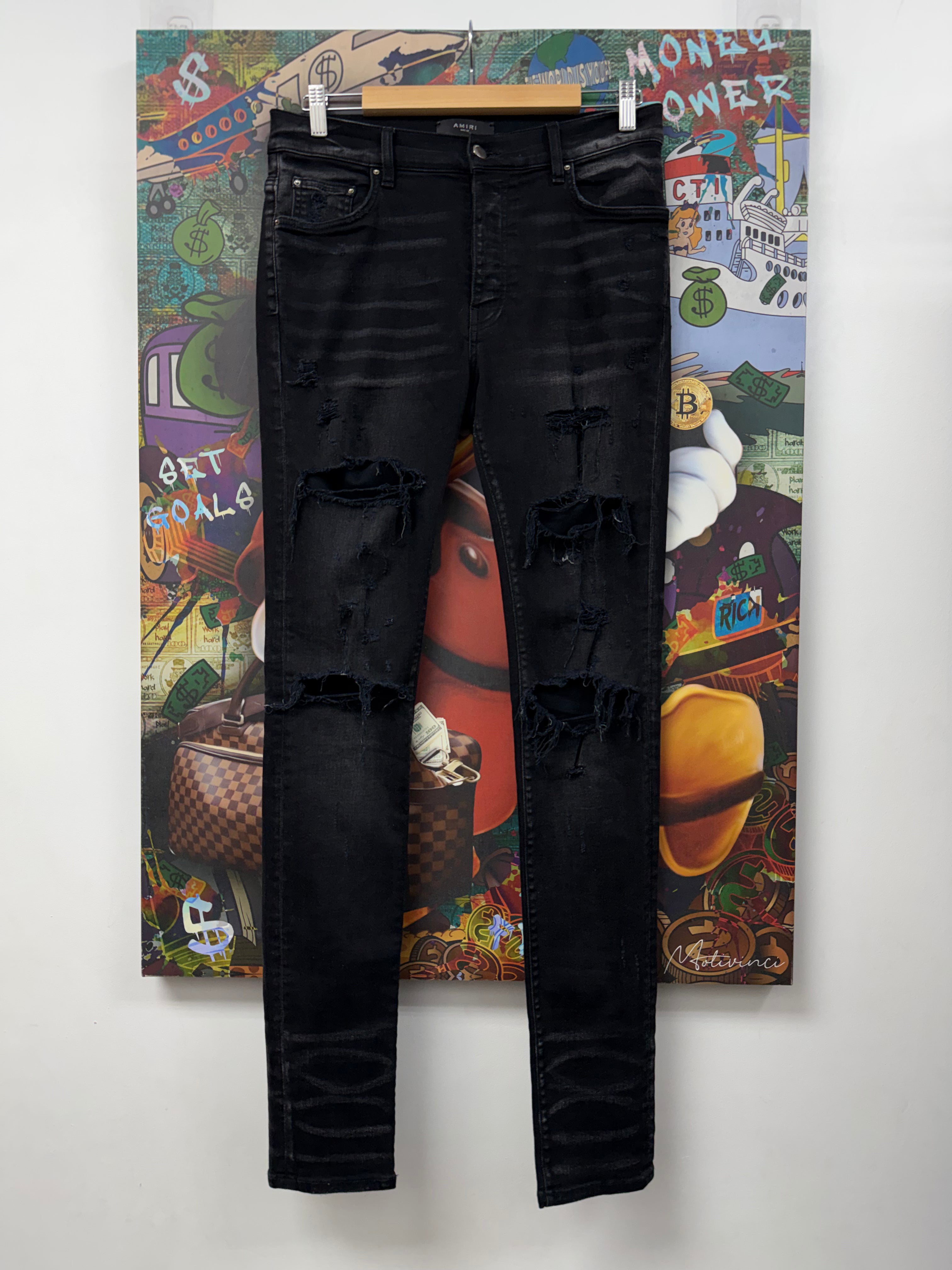 Amiri Black Ripped Thrasher Jeans