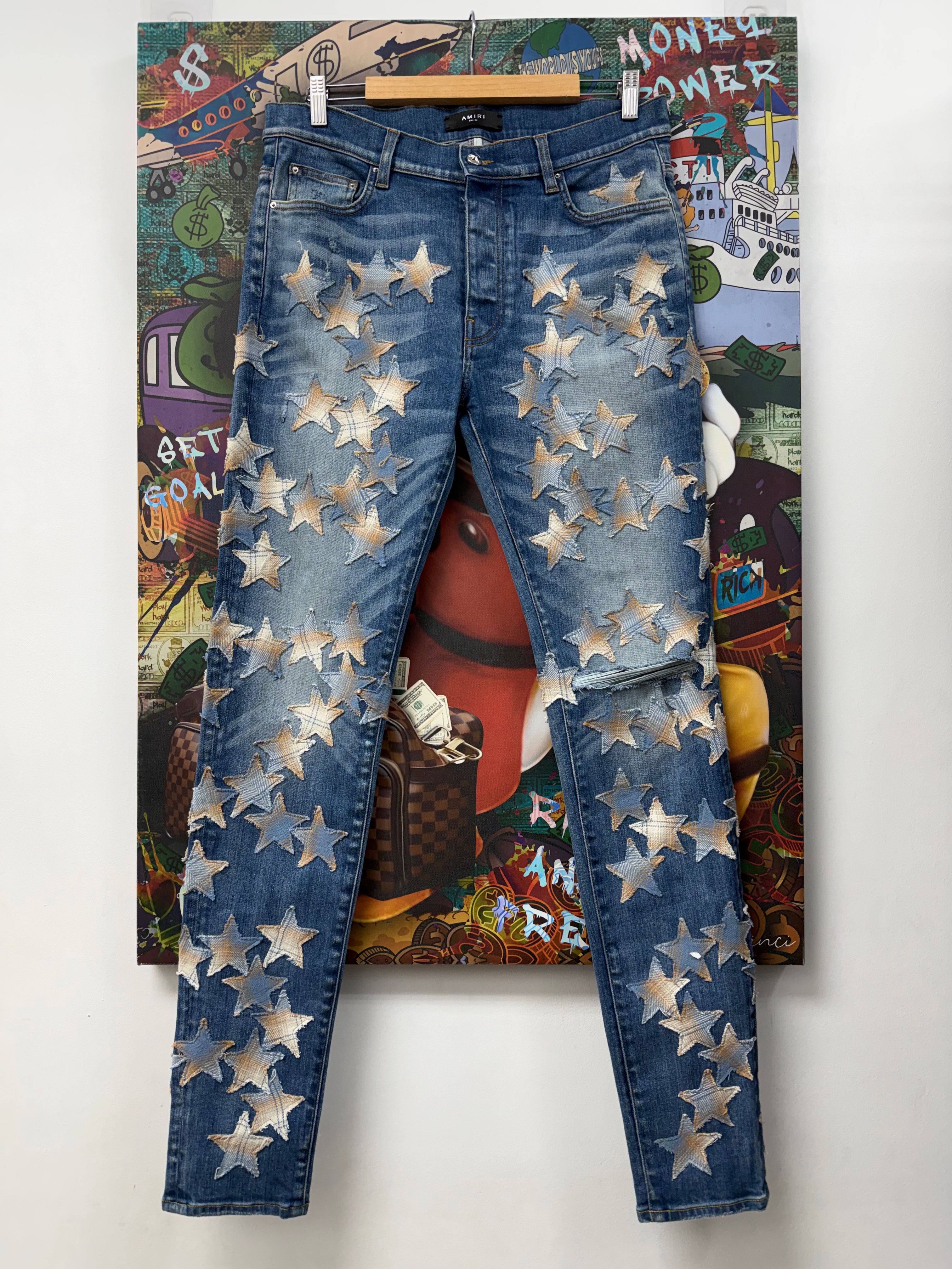 Amiri Light Wash Denim Chemist Star Jeans