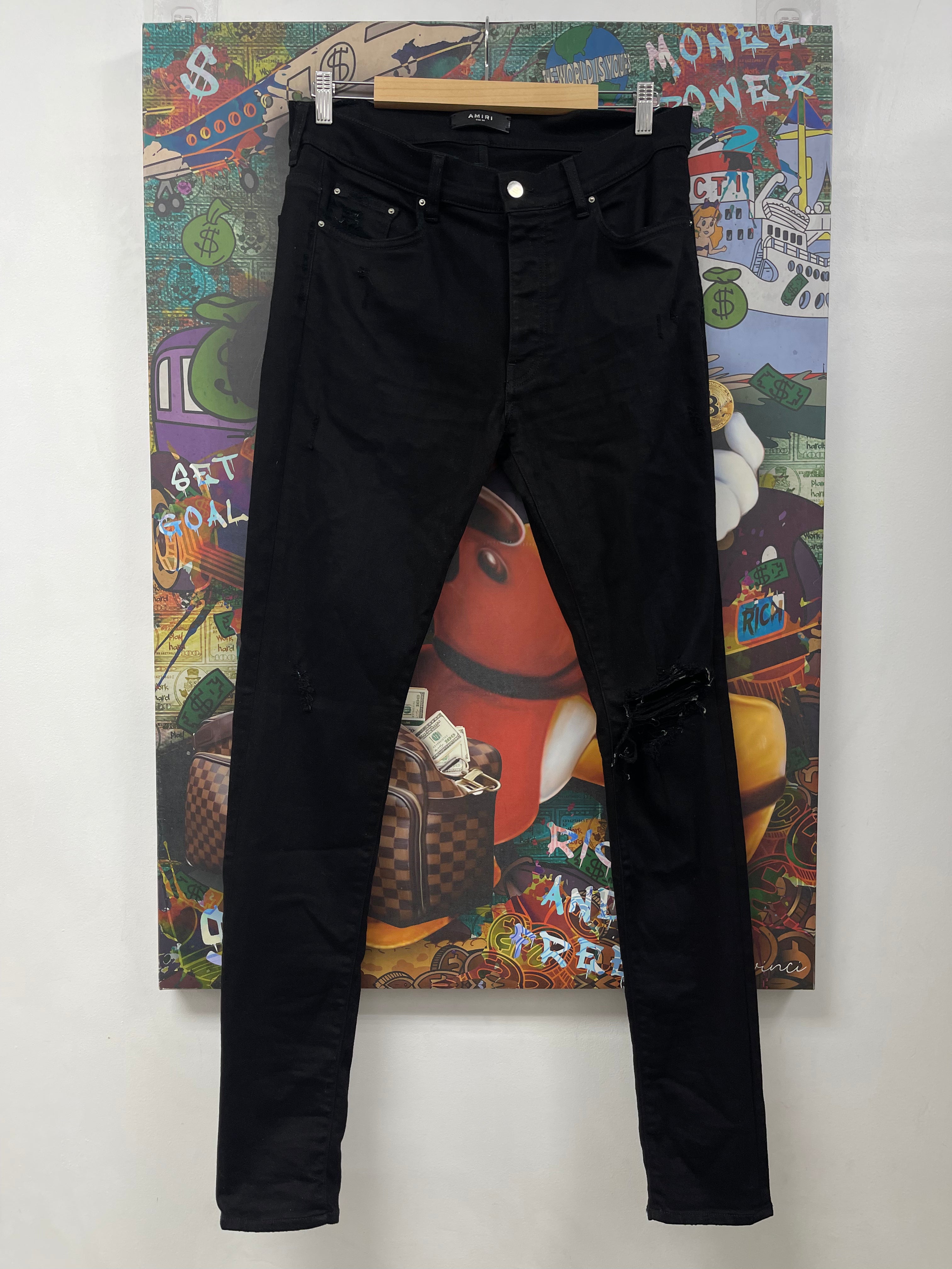 Amiri Black Knee Ripped Jeans