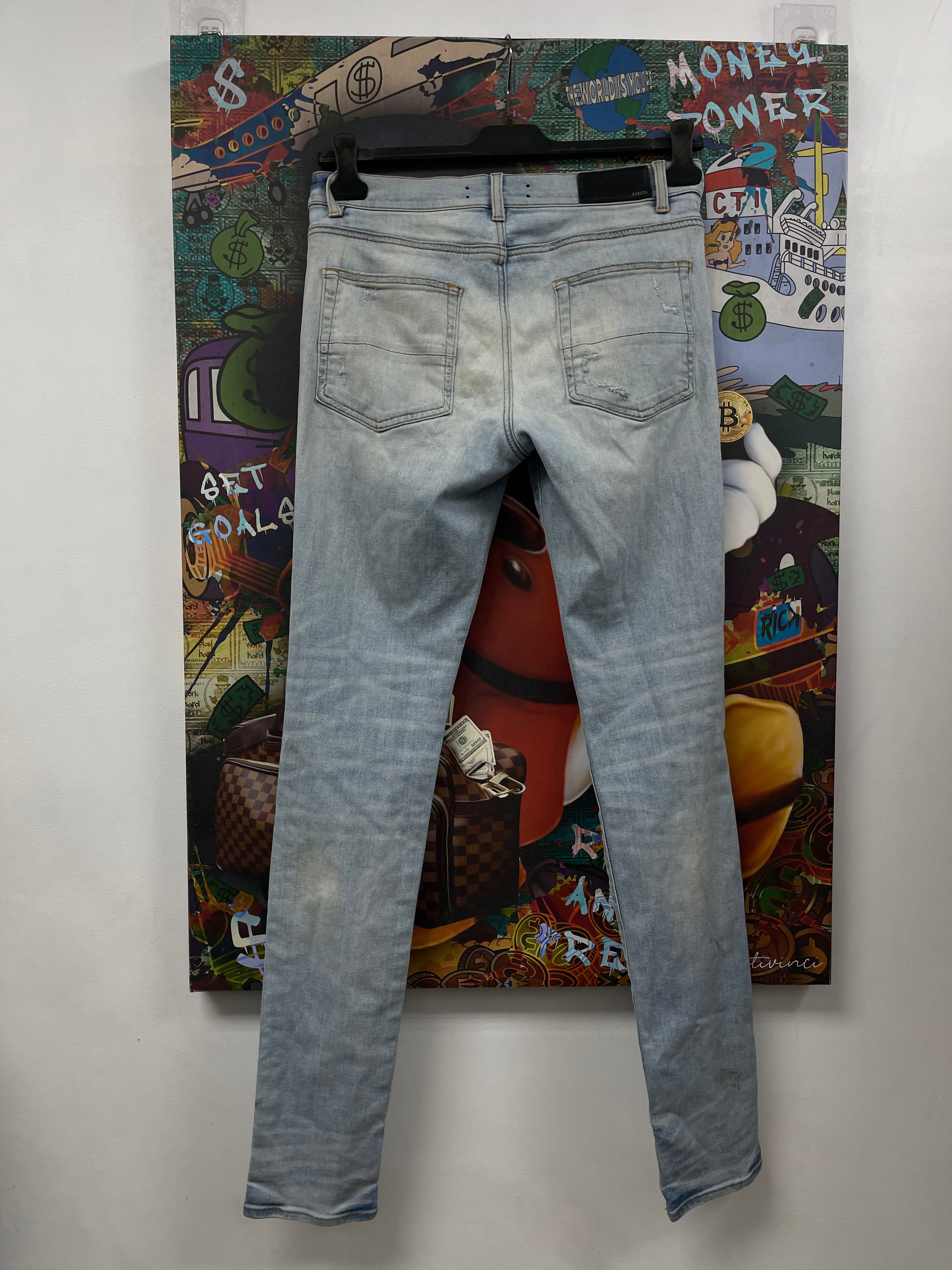 Amiri MX1 Light Wash Tie Dye Paisley Patch Jeans