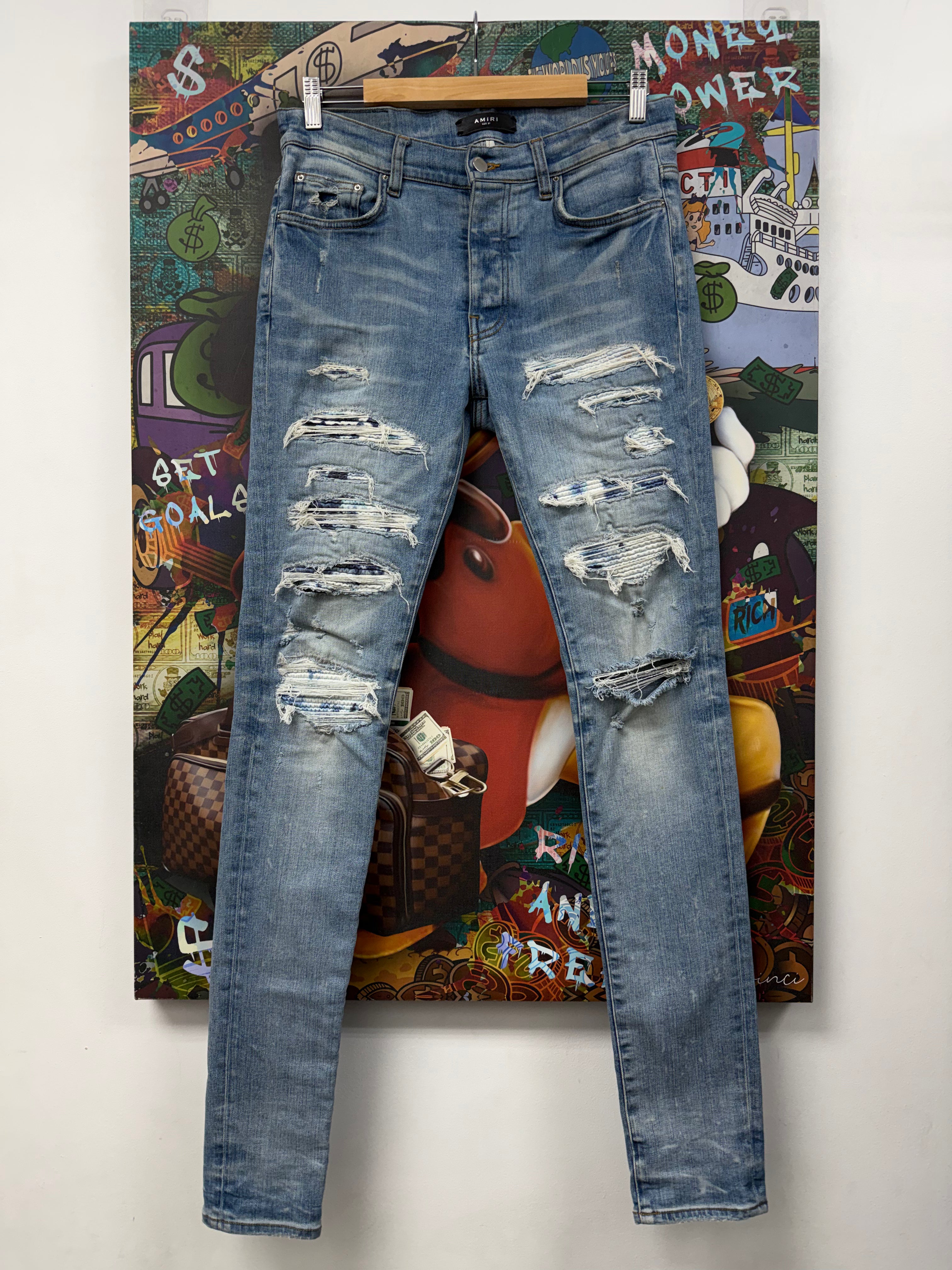 Amiri Lightwash Tie Dye Thrasher Jeans