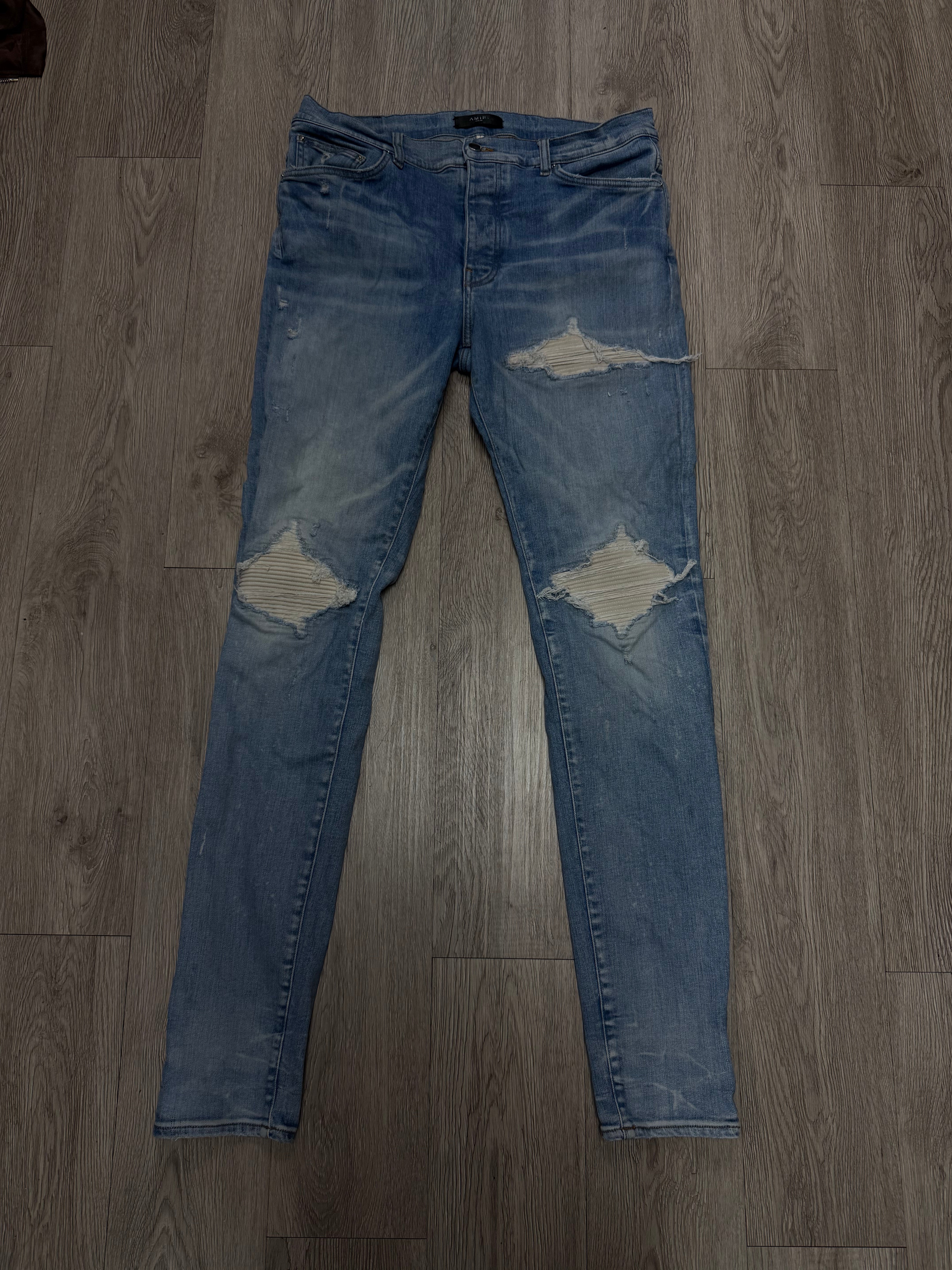 Amiri MX1 Light Wash White Patch Jeans