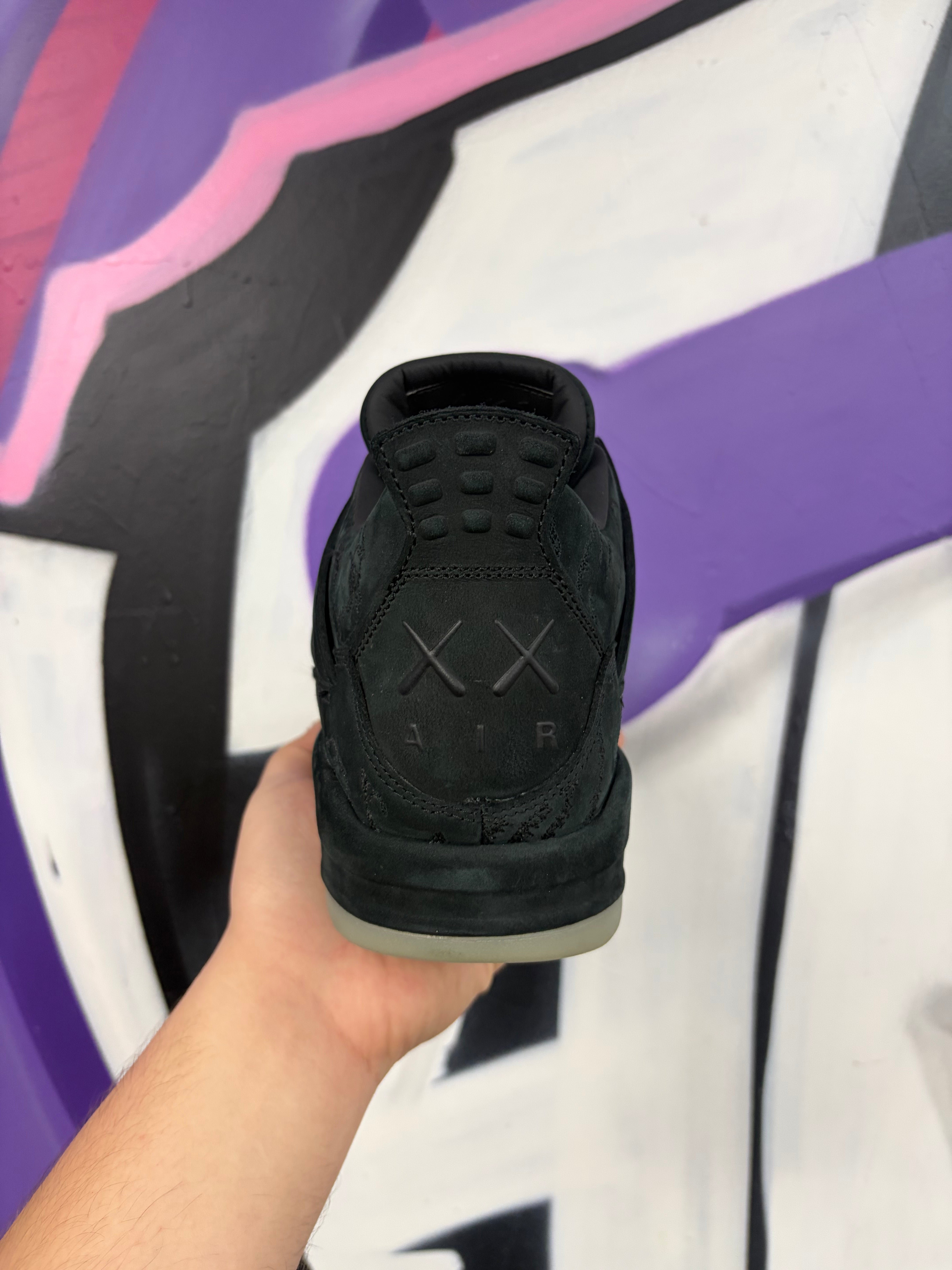 Jordan 4 Kaws Black Sneakers