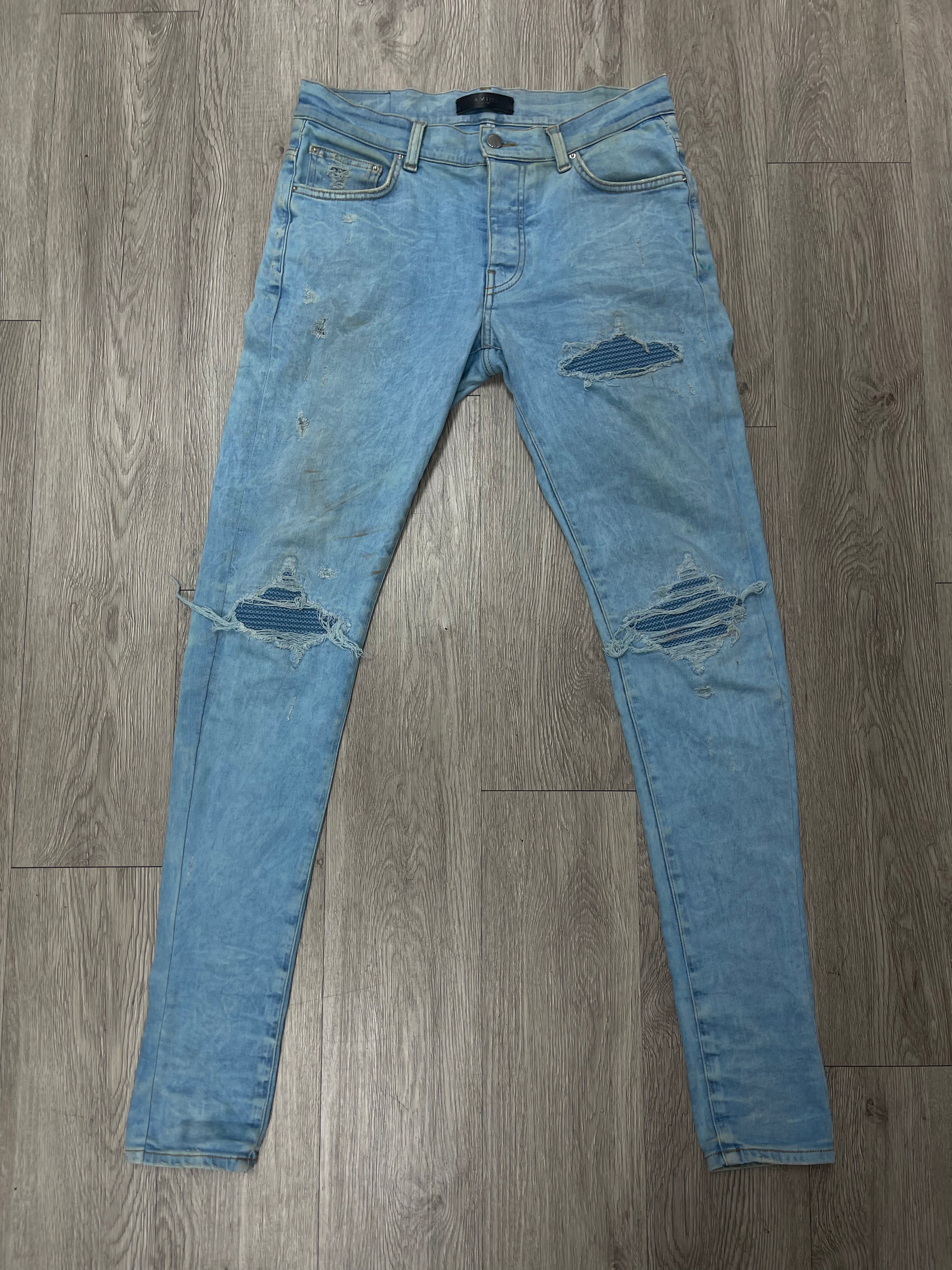 Amiri MX1 Light Wash Blue Mesh Patch Jeans