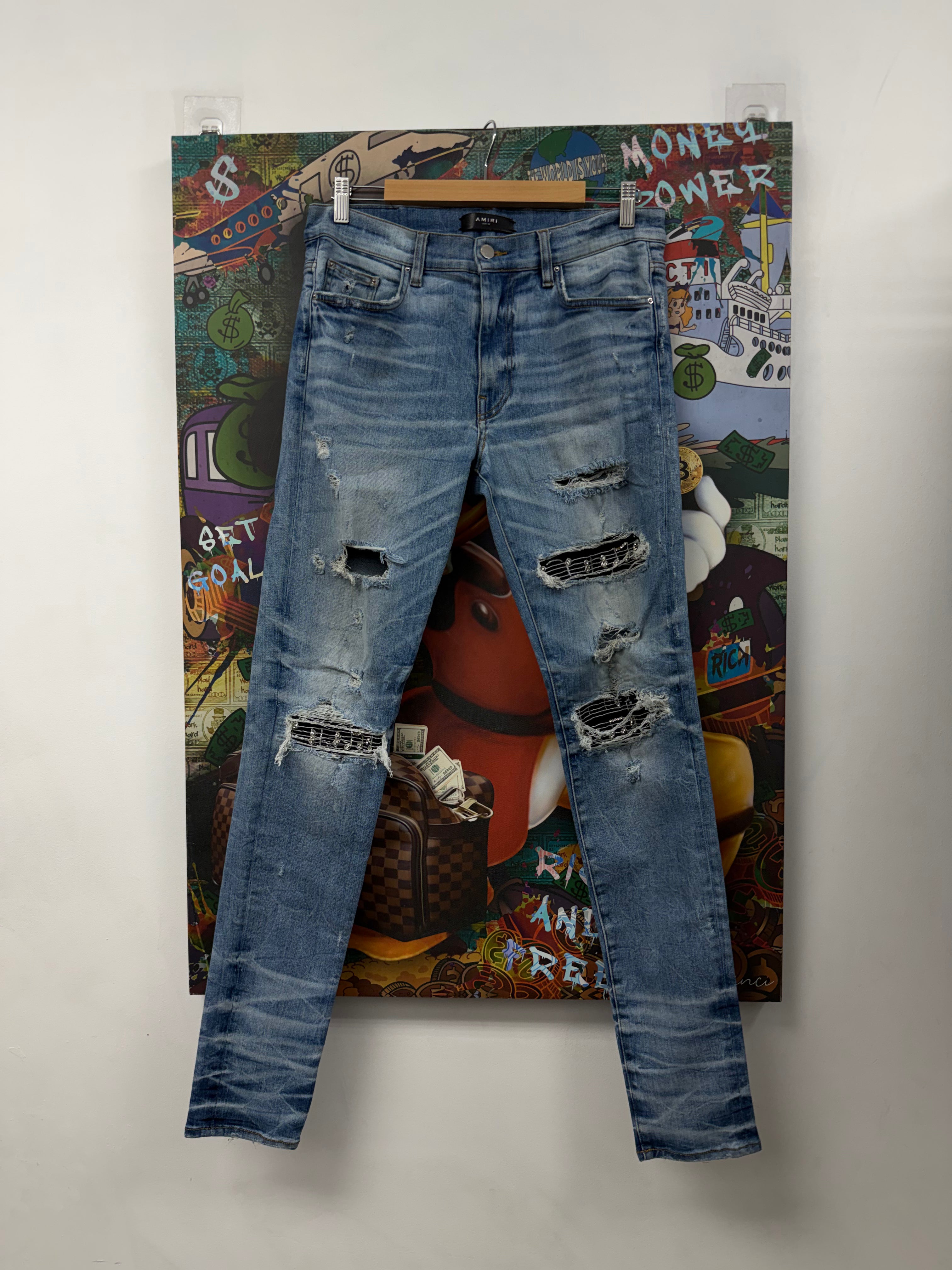 Amiri Light Wash Music Patch Jeans