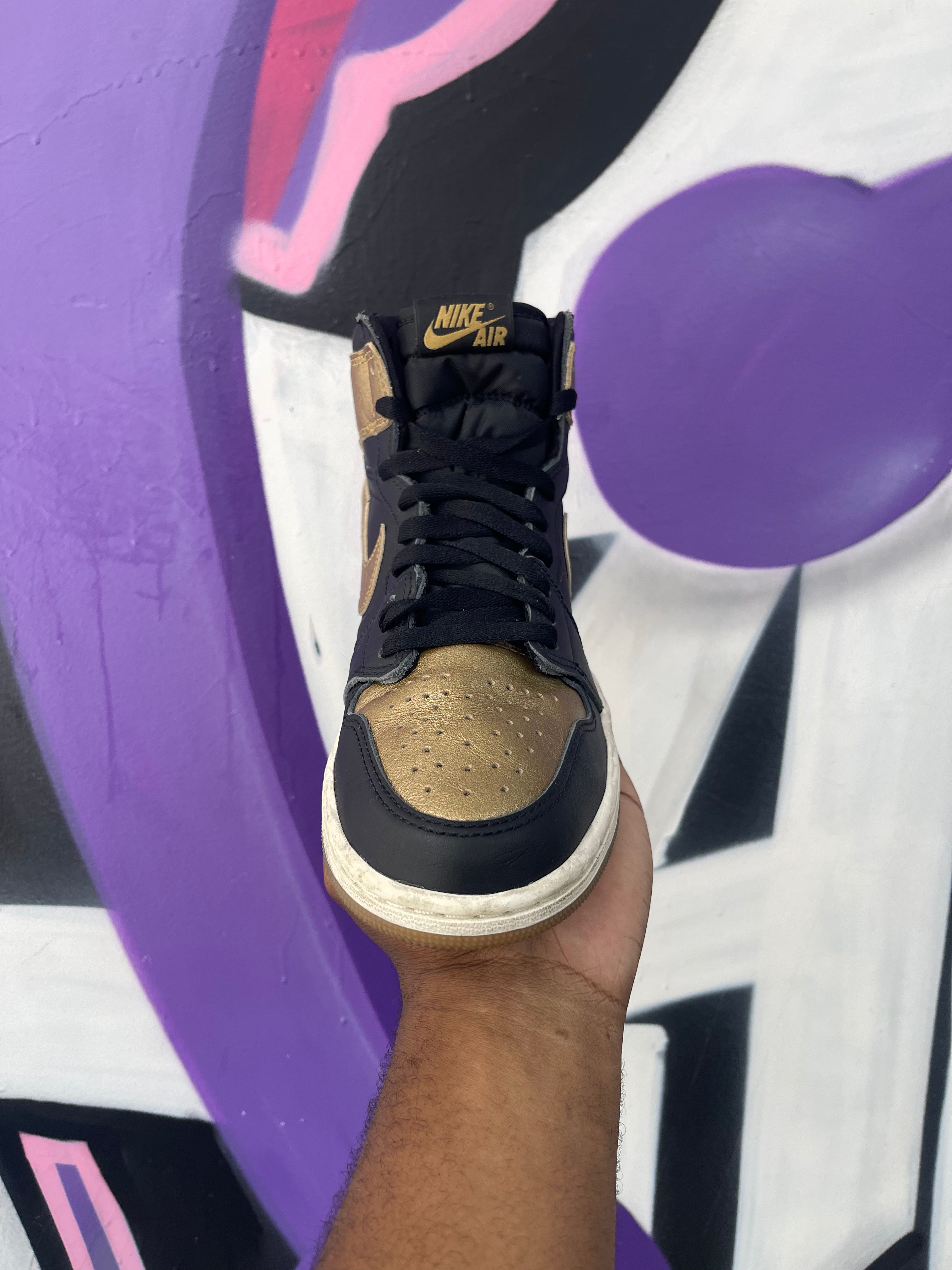 Jordan 1 Black Metallic Gold Sneakers