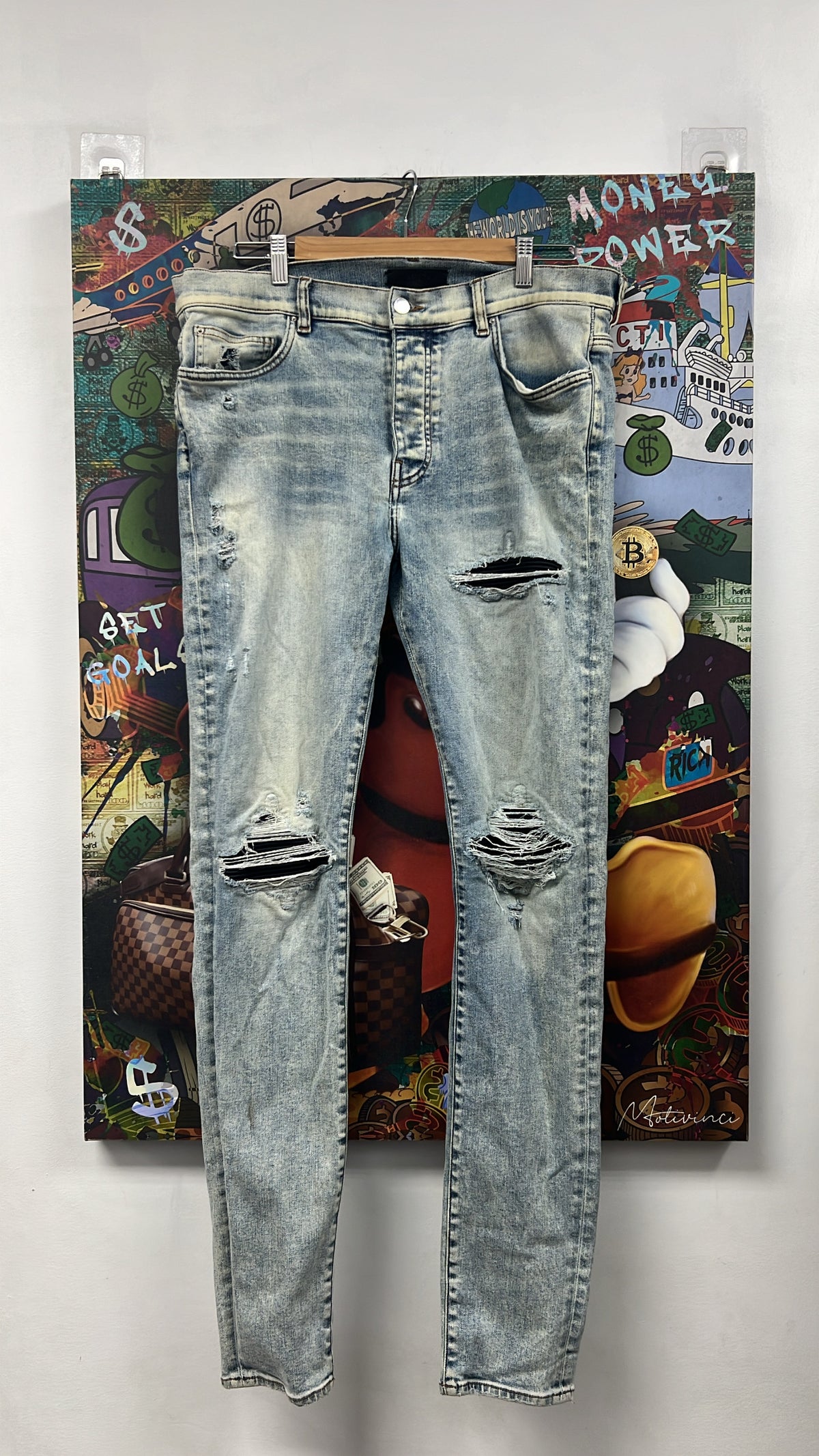 Amiri Mx1 Light Wash Black Patch Jeans