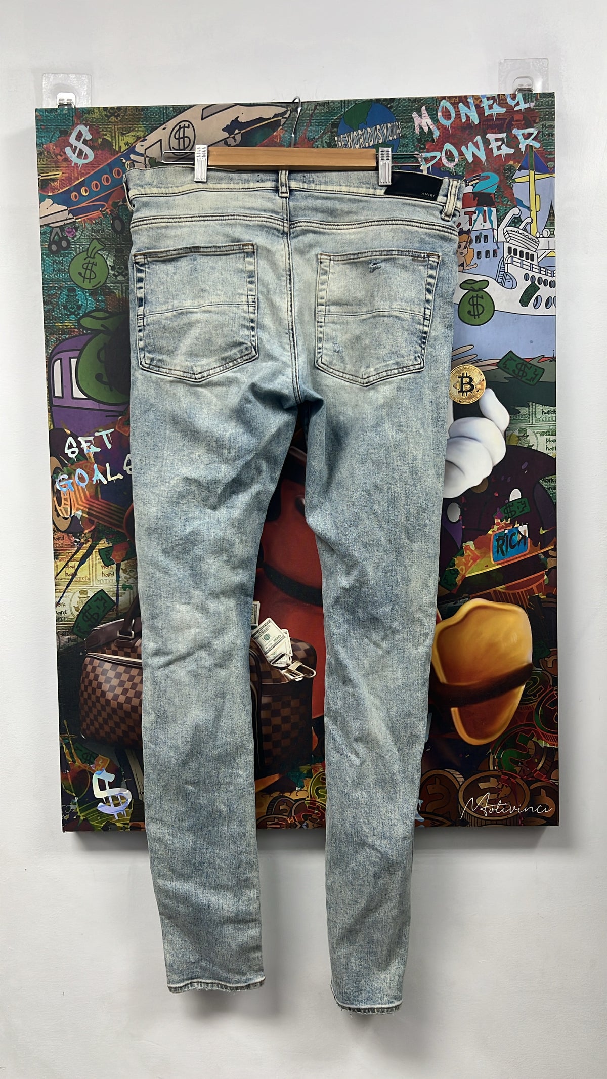 Amiri Mx1 Light Wash Black Patch Jeans