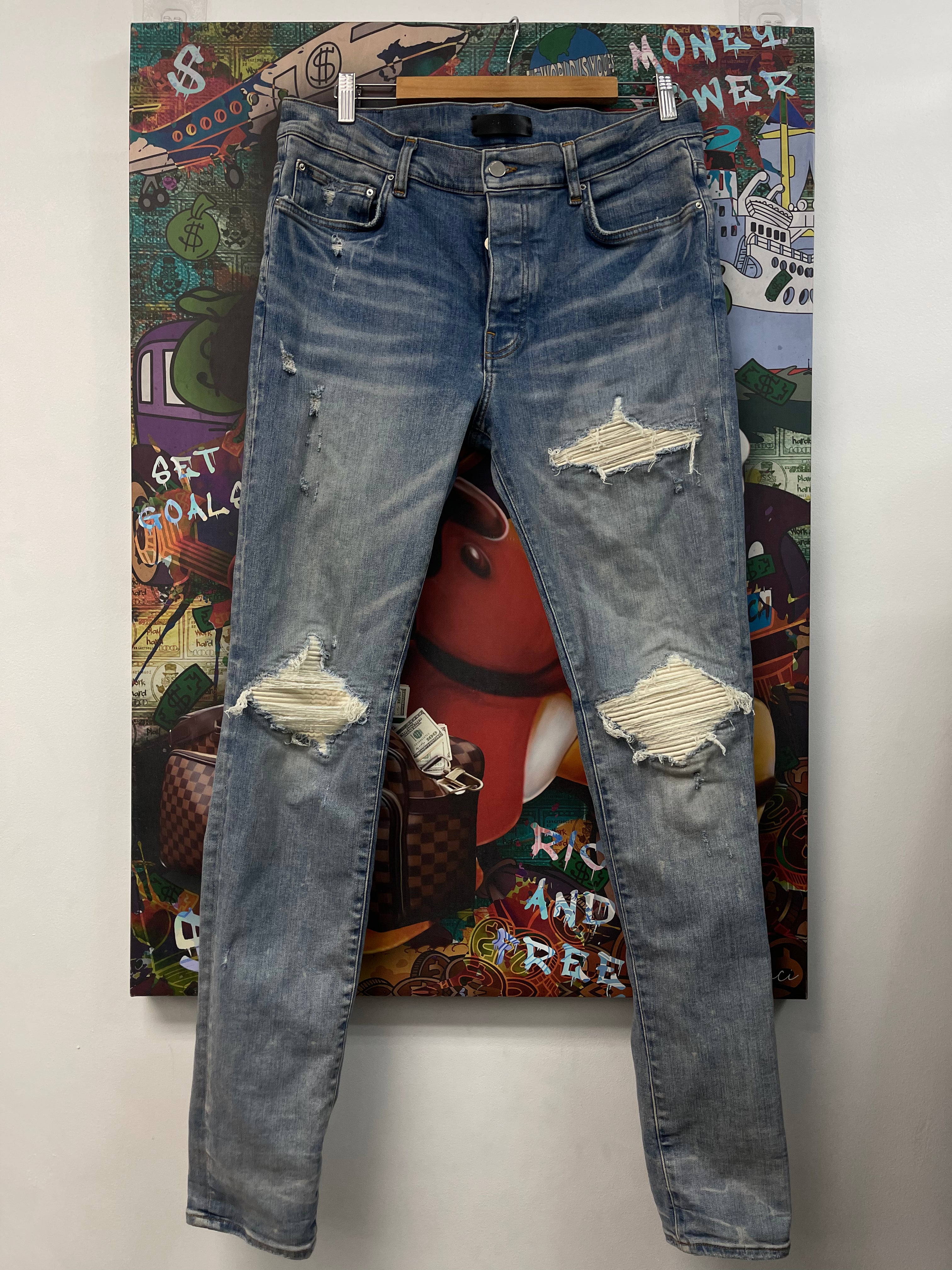 Amiri Light Wash White Patch MX1 Jeans