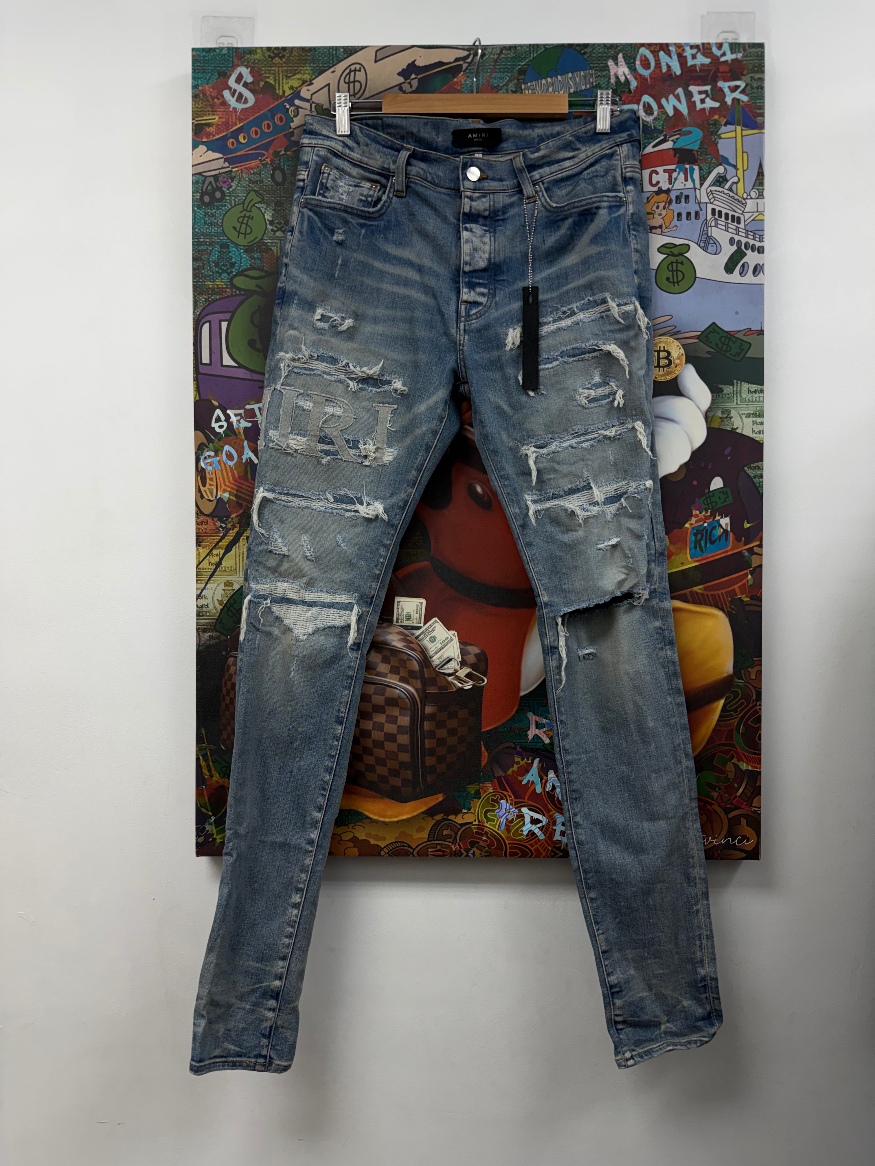 Amiri Light Wash Distressed Side Logo Jeans