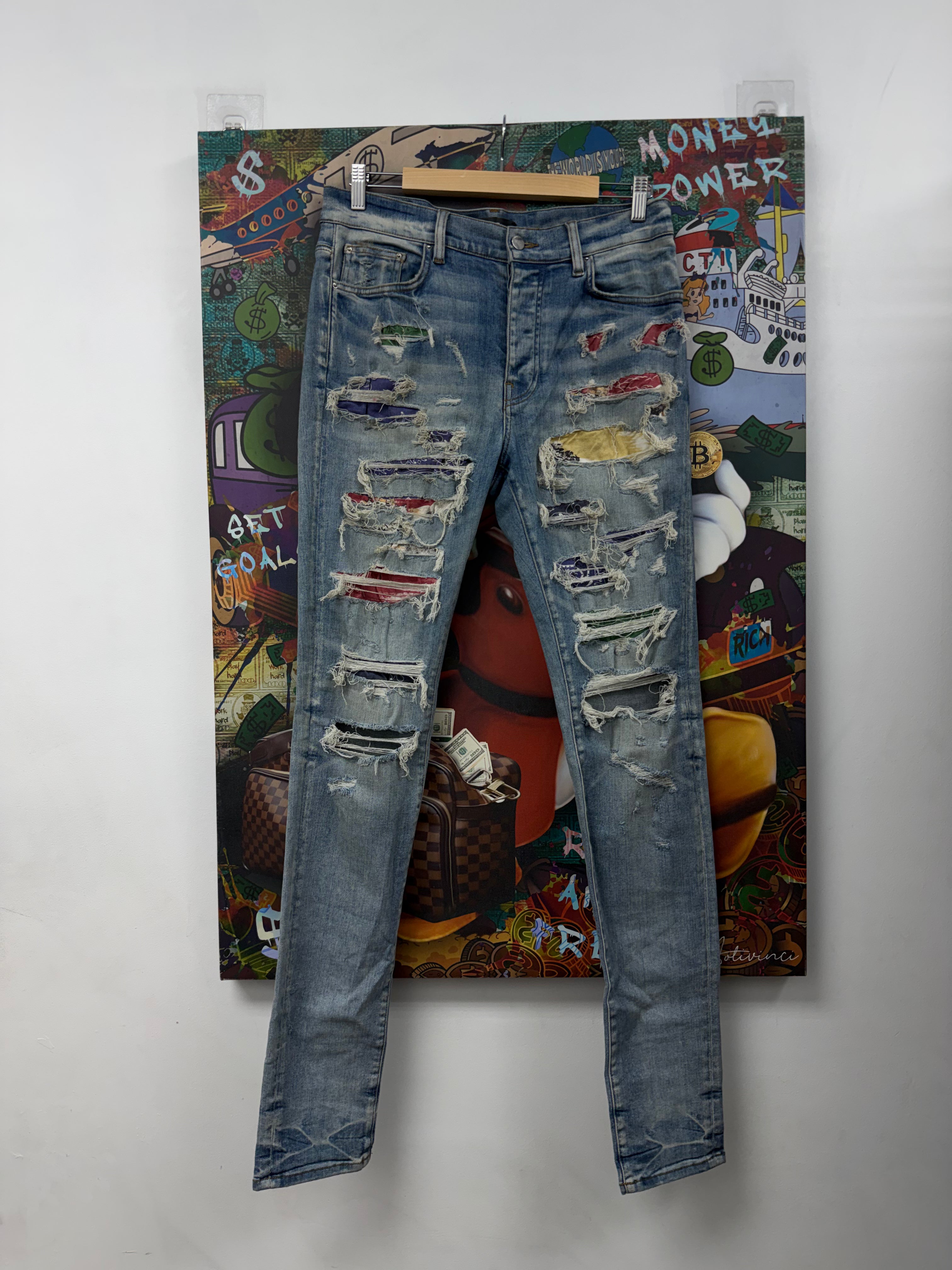 Amiri Light Wash Rainbow Thrasher Jeans