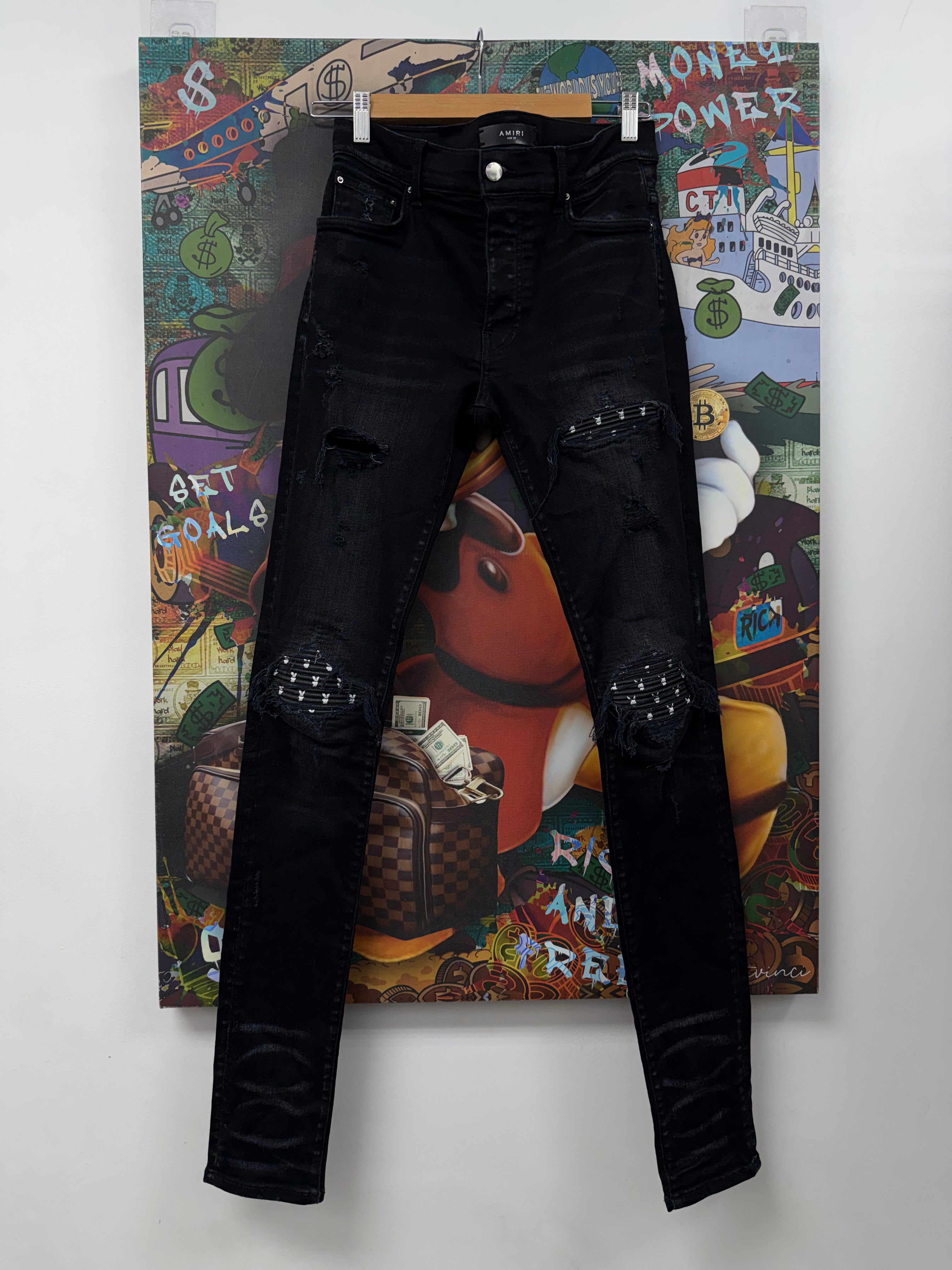 Amiri MX1 Black Wash Playboy Patch Jeans