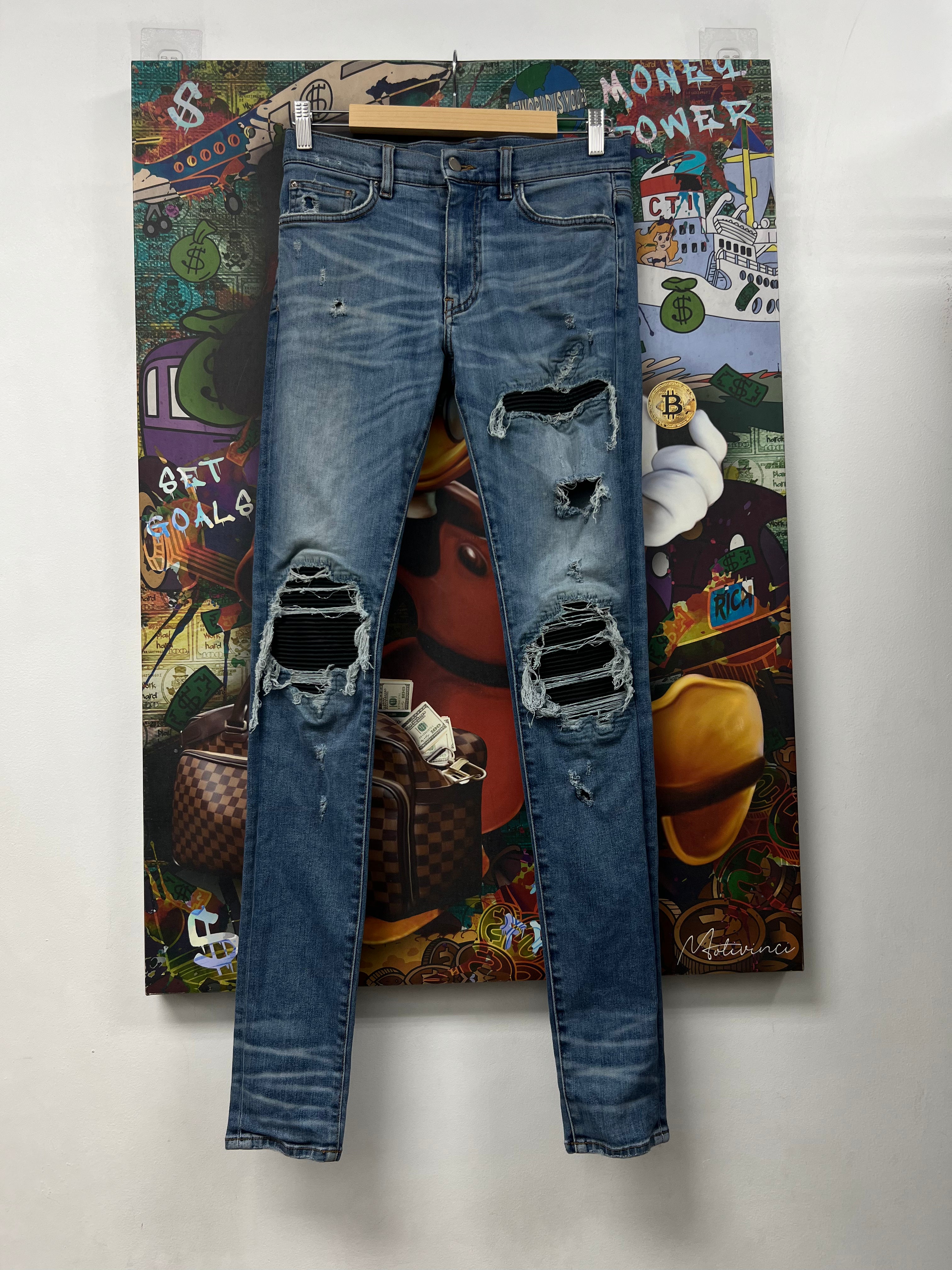Amiri MX1 Light Wash Black Patch Jeans