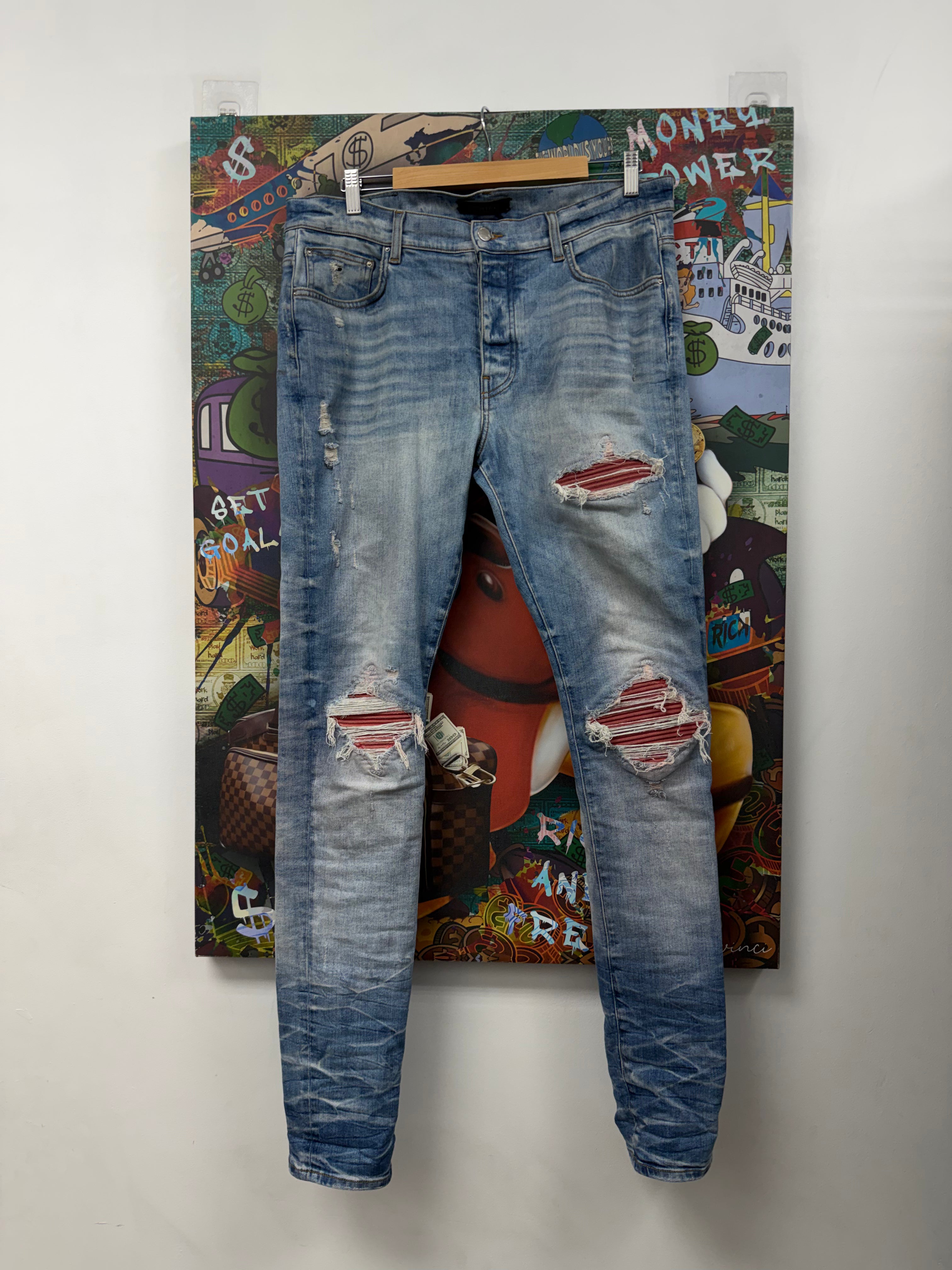 Amiri Light Wash Red Suede Side Logo Jeans