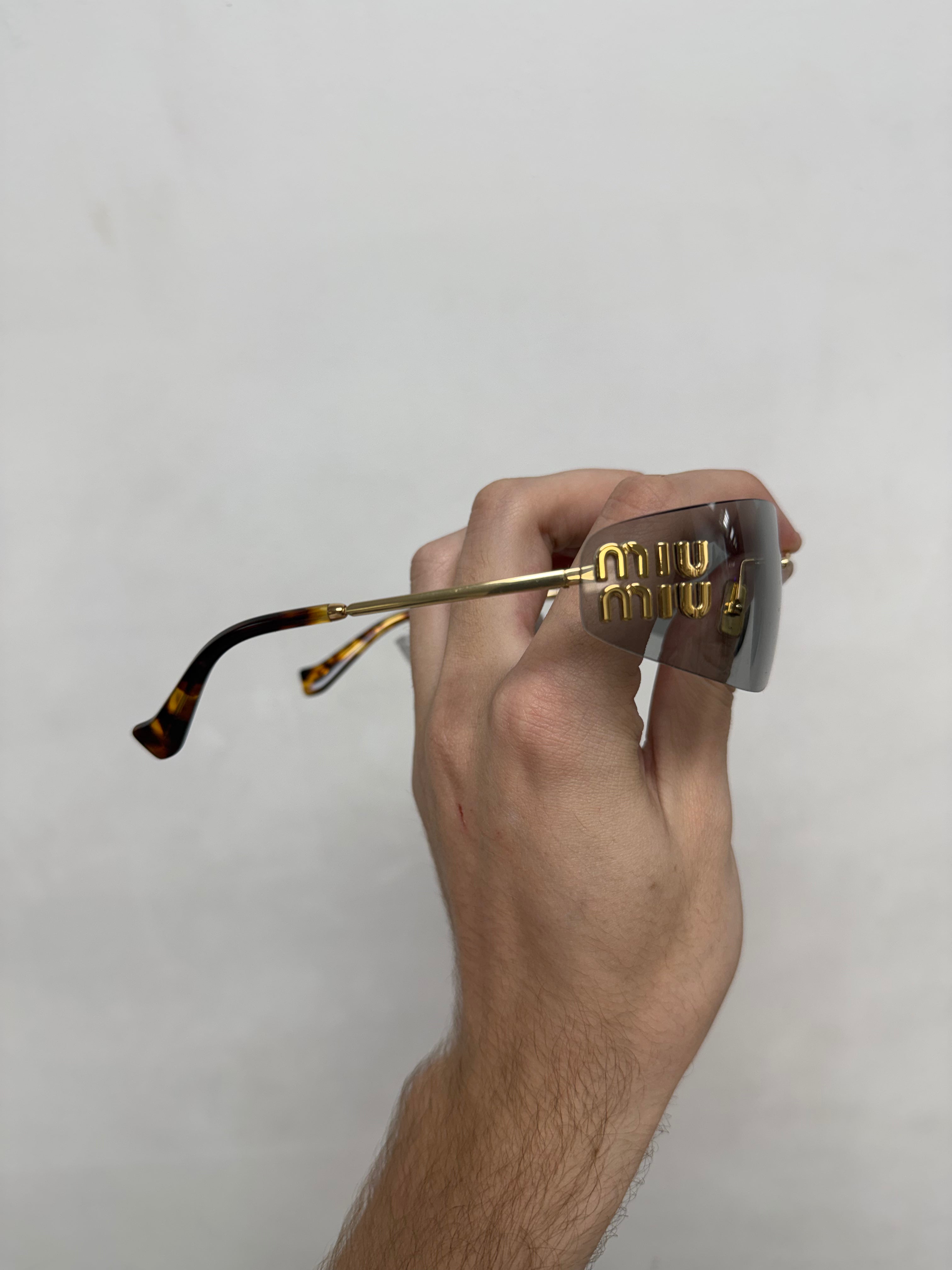Miu Miu Gold Aube Rimless Glasses