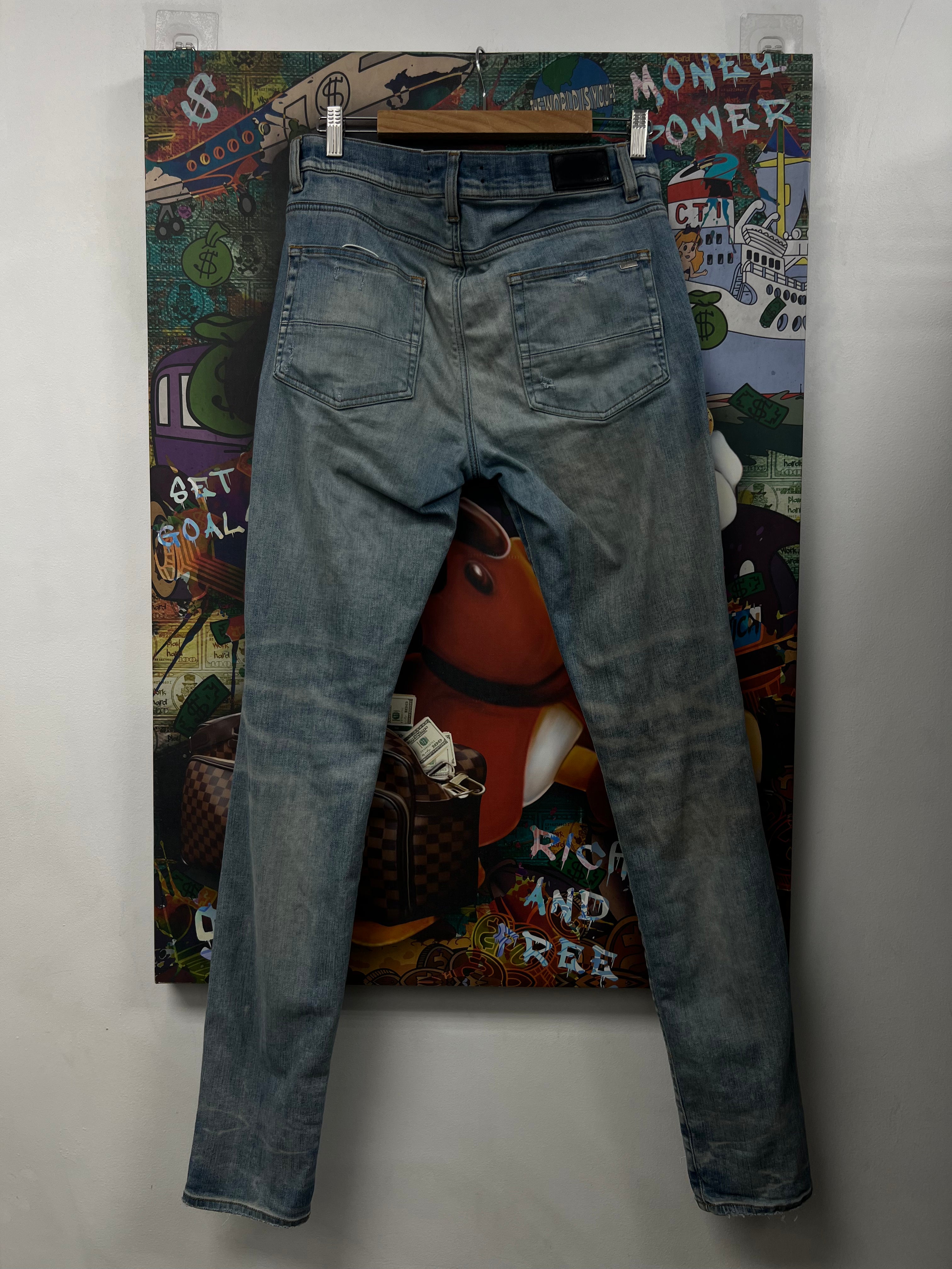 Amiri Light Wash Cherub Jeans