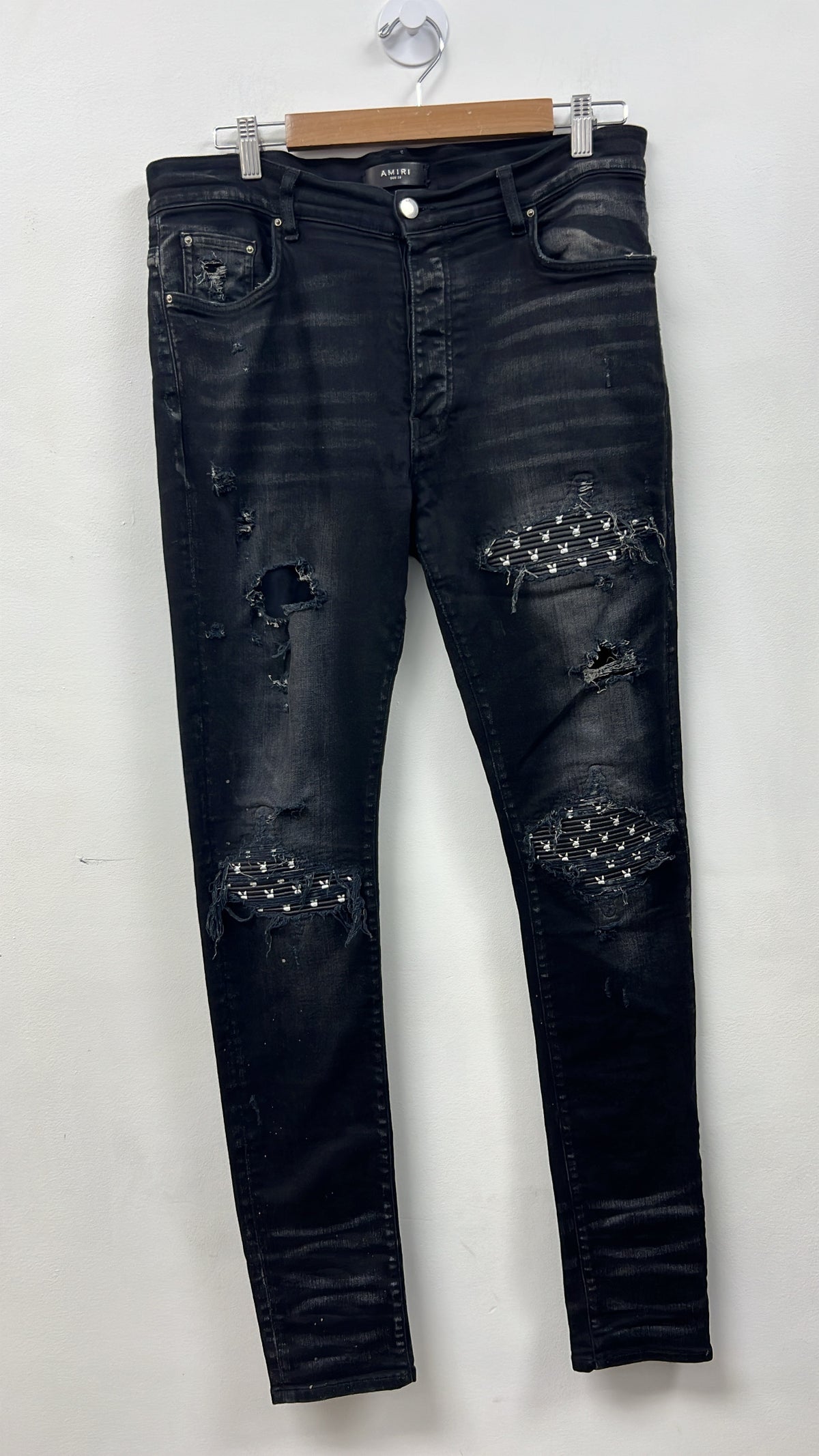 Amiri MX1 Black Wash Playboy Patch Jeans