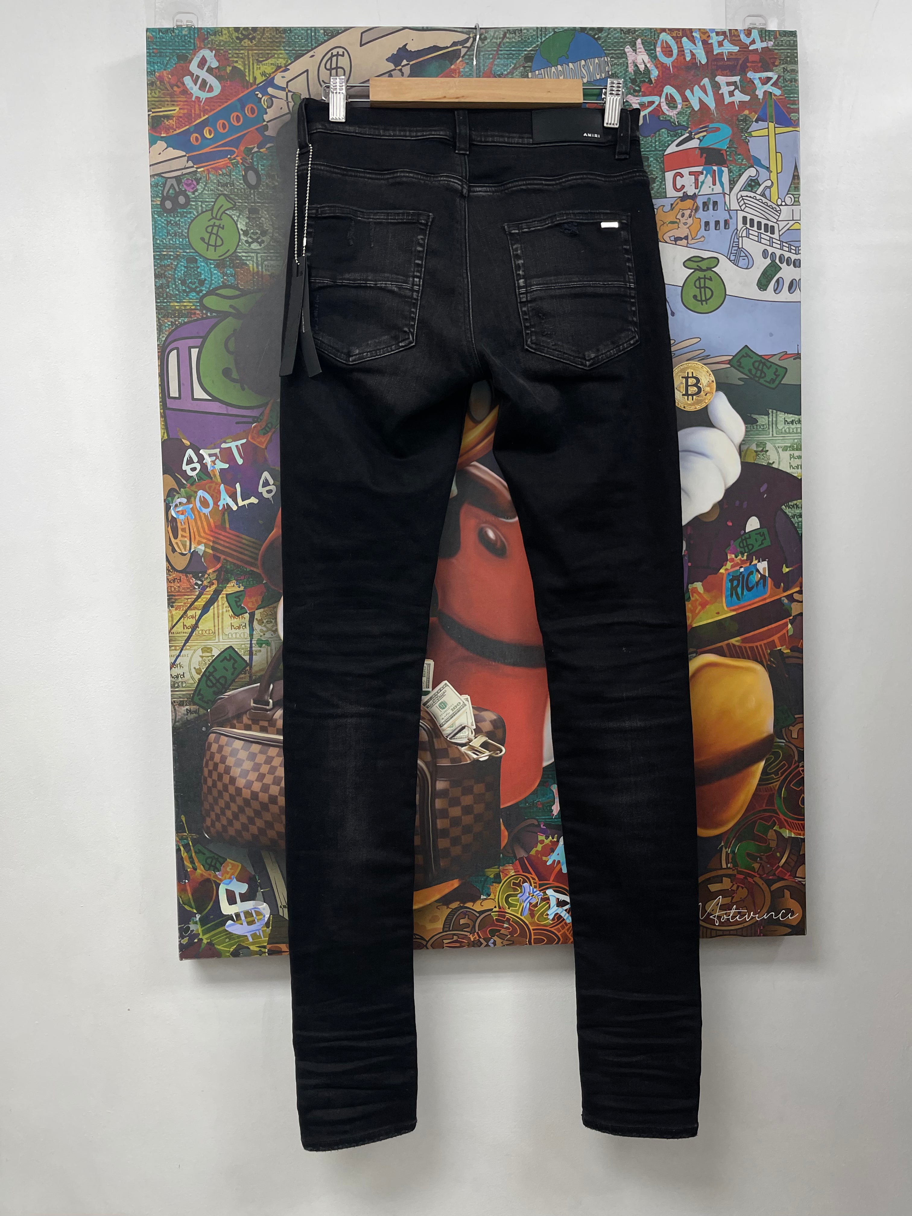 Amiri MX1 Black Wash Boucle Patch Jeans