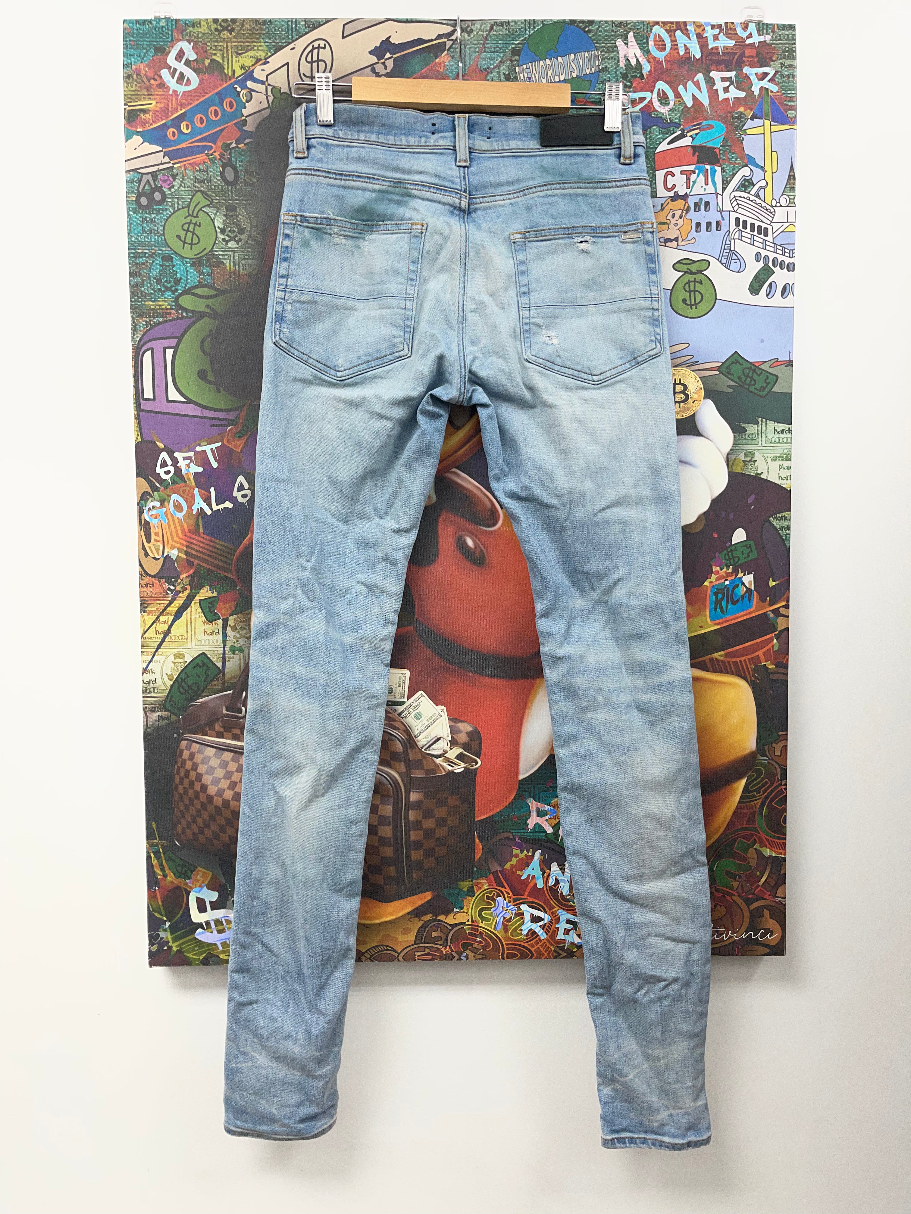 Amiri Light Wash Sunset Thrasher Patch (Tear By Crotch) Jeans