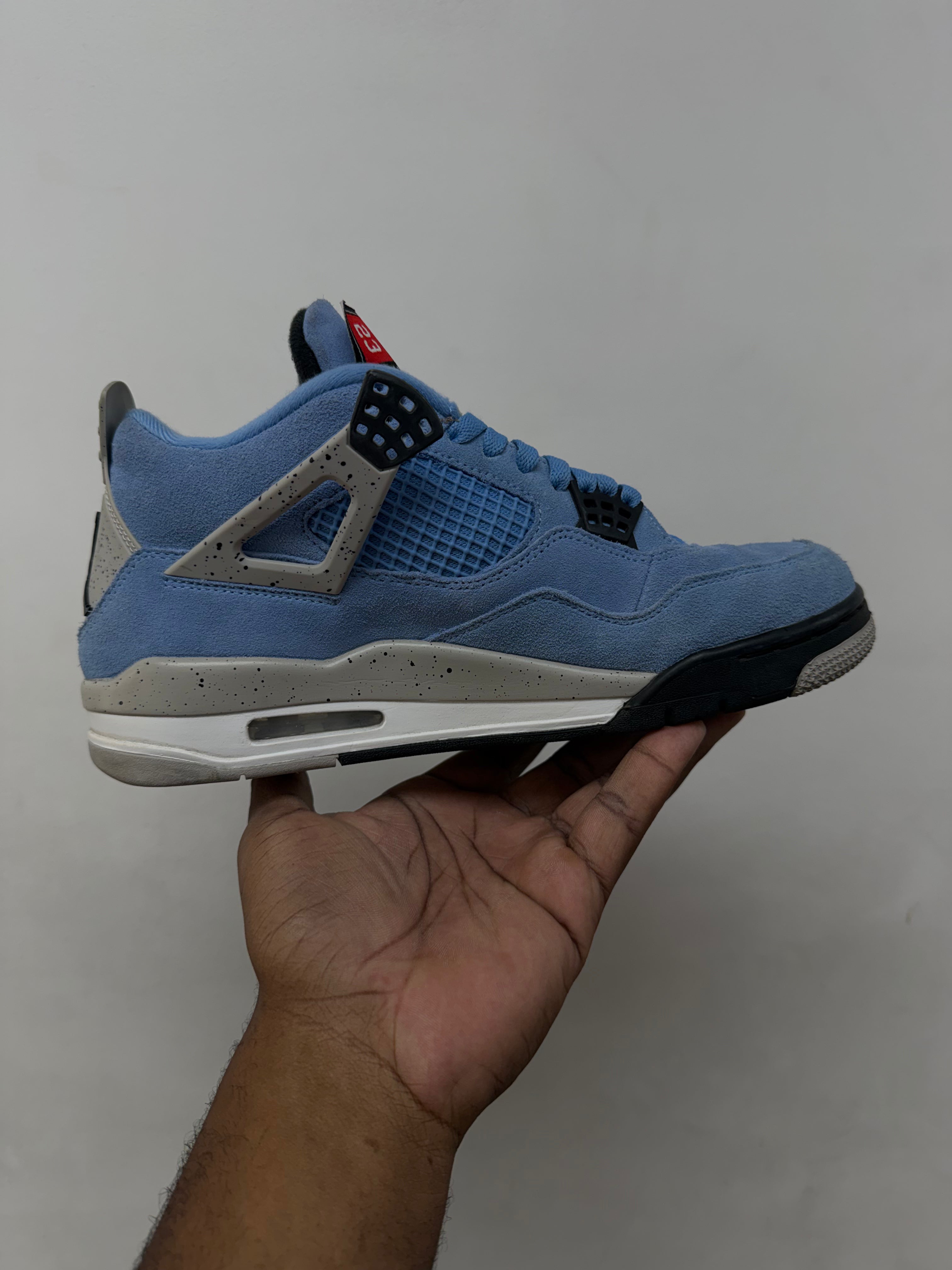 Jordan 4 University Blue Sneakers