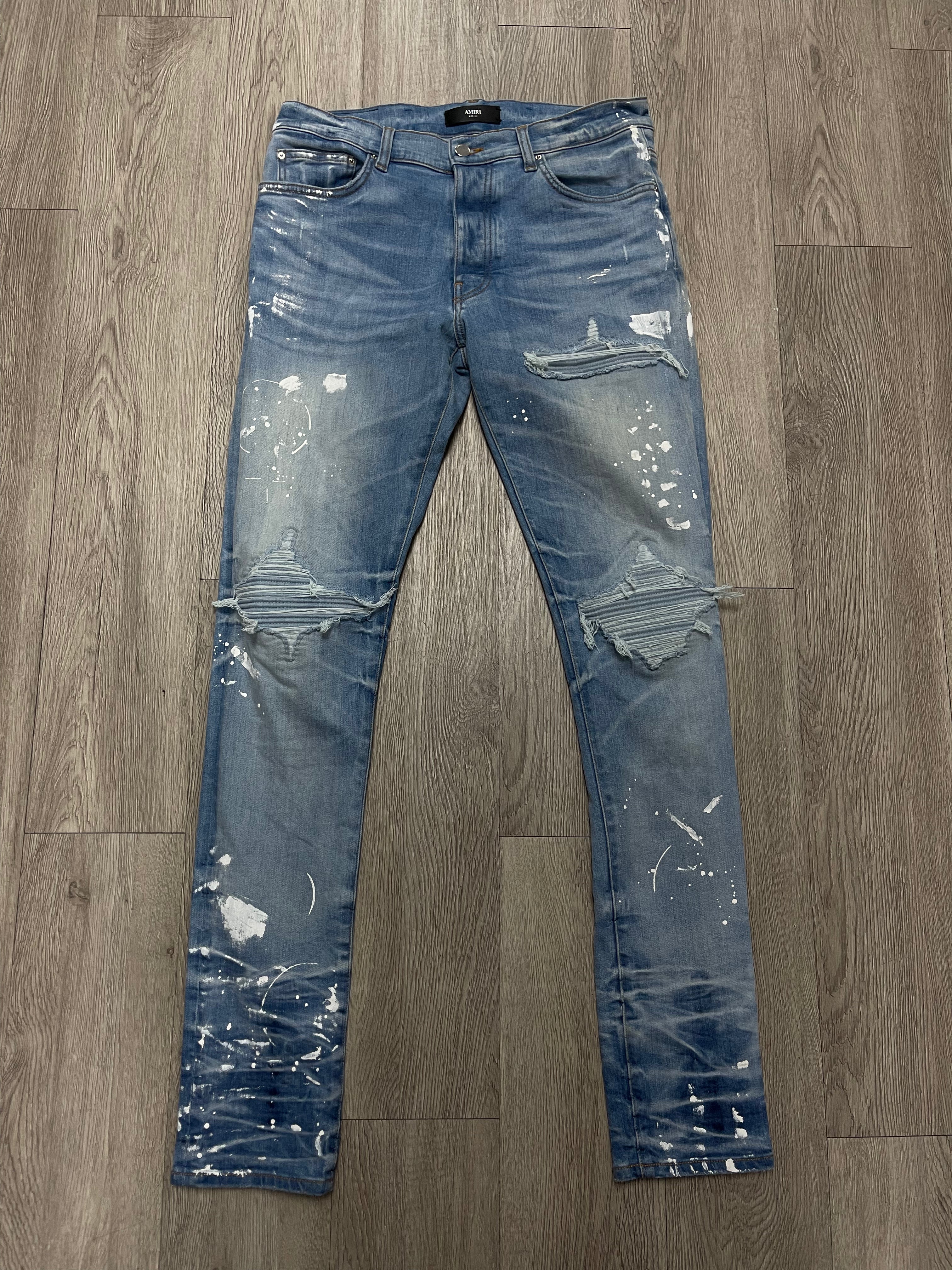 Amiri Light Wash Denim Splatter Patch MX1 Jeans