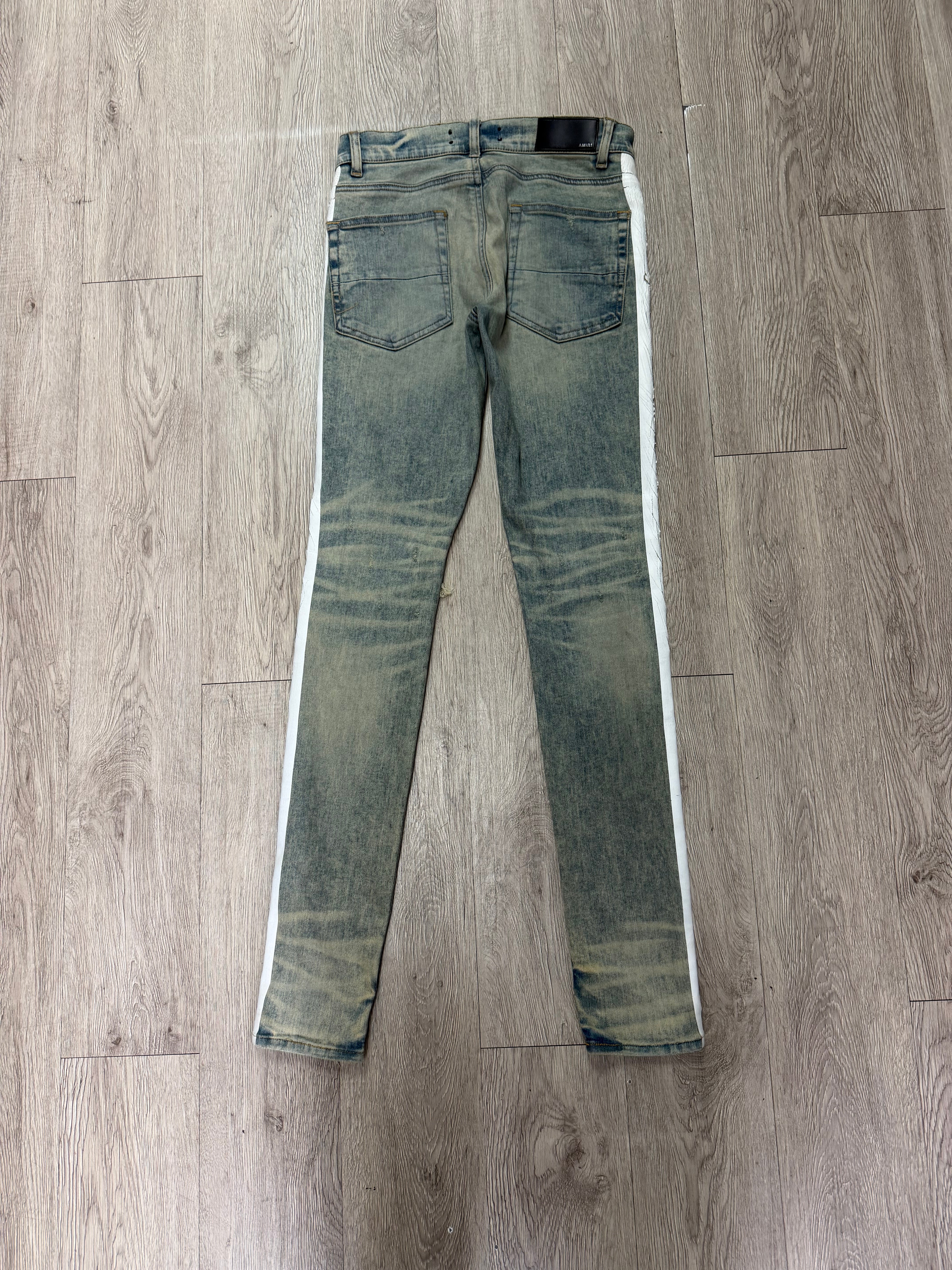 Amiri Light Wash White Stripe Jeans