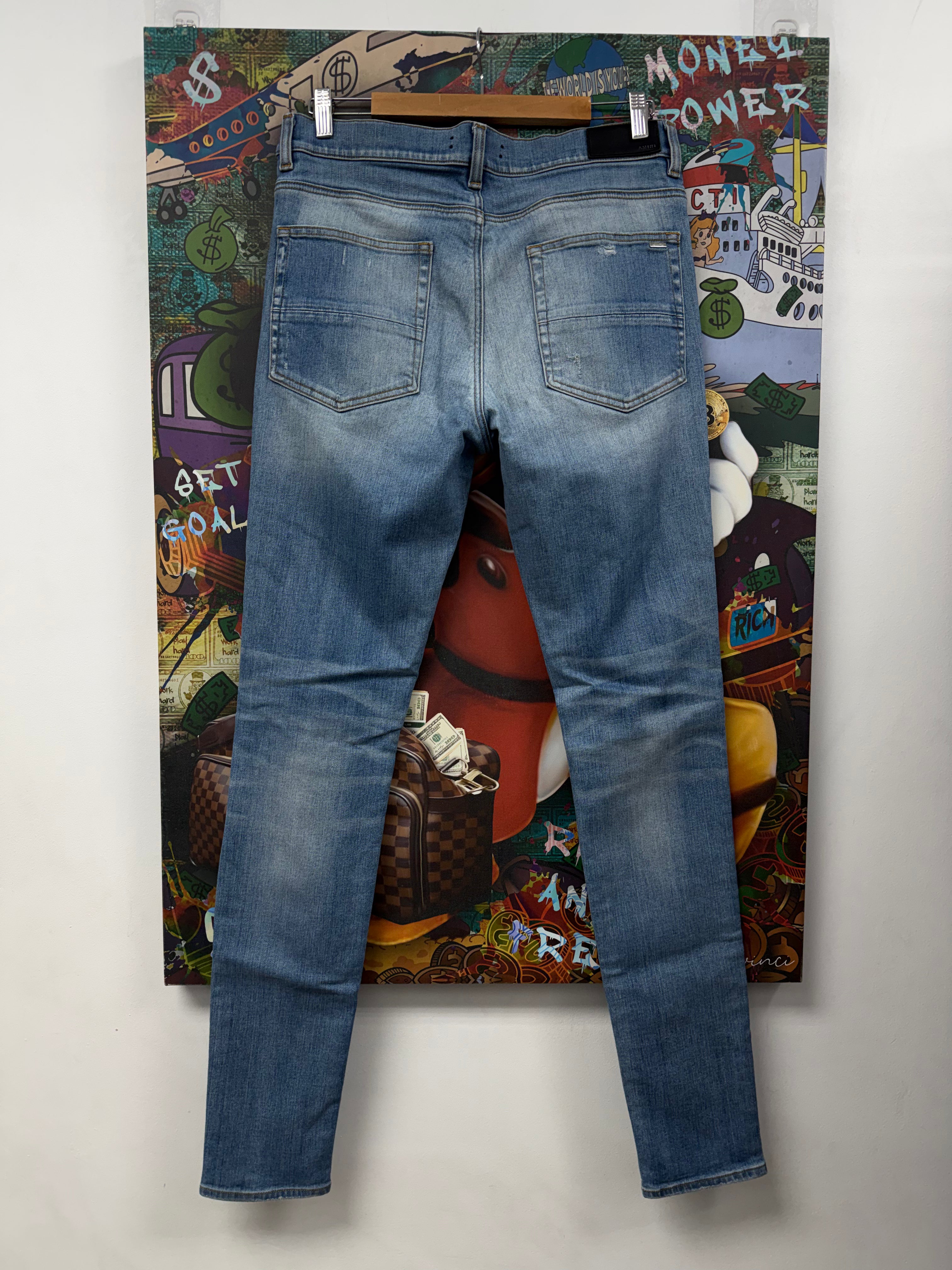 Amiri MX1 Light Wash Aloha Patch Jeans