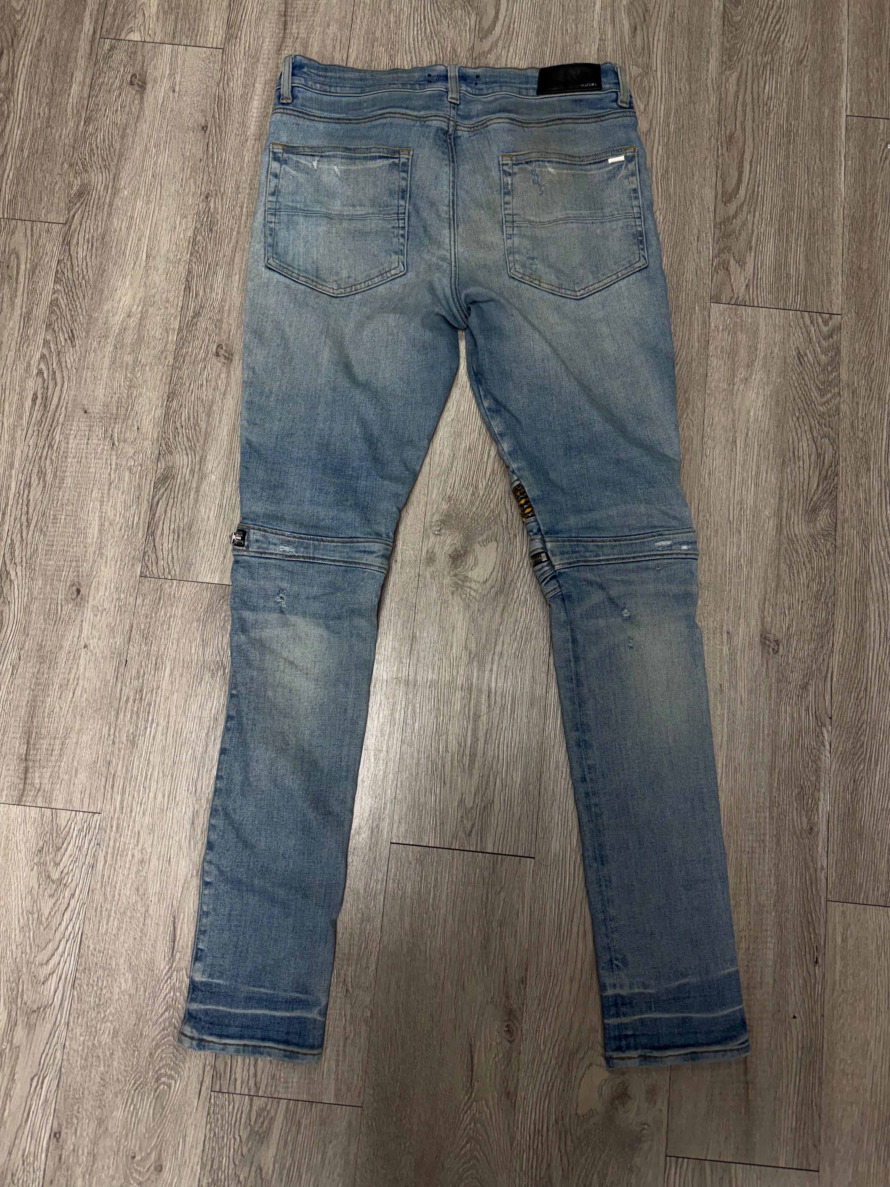 Amiri MX2 Light Wash Yellow Brown Patch Jeans