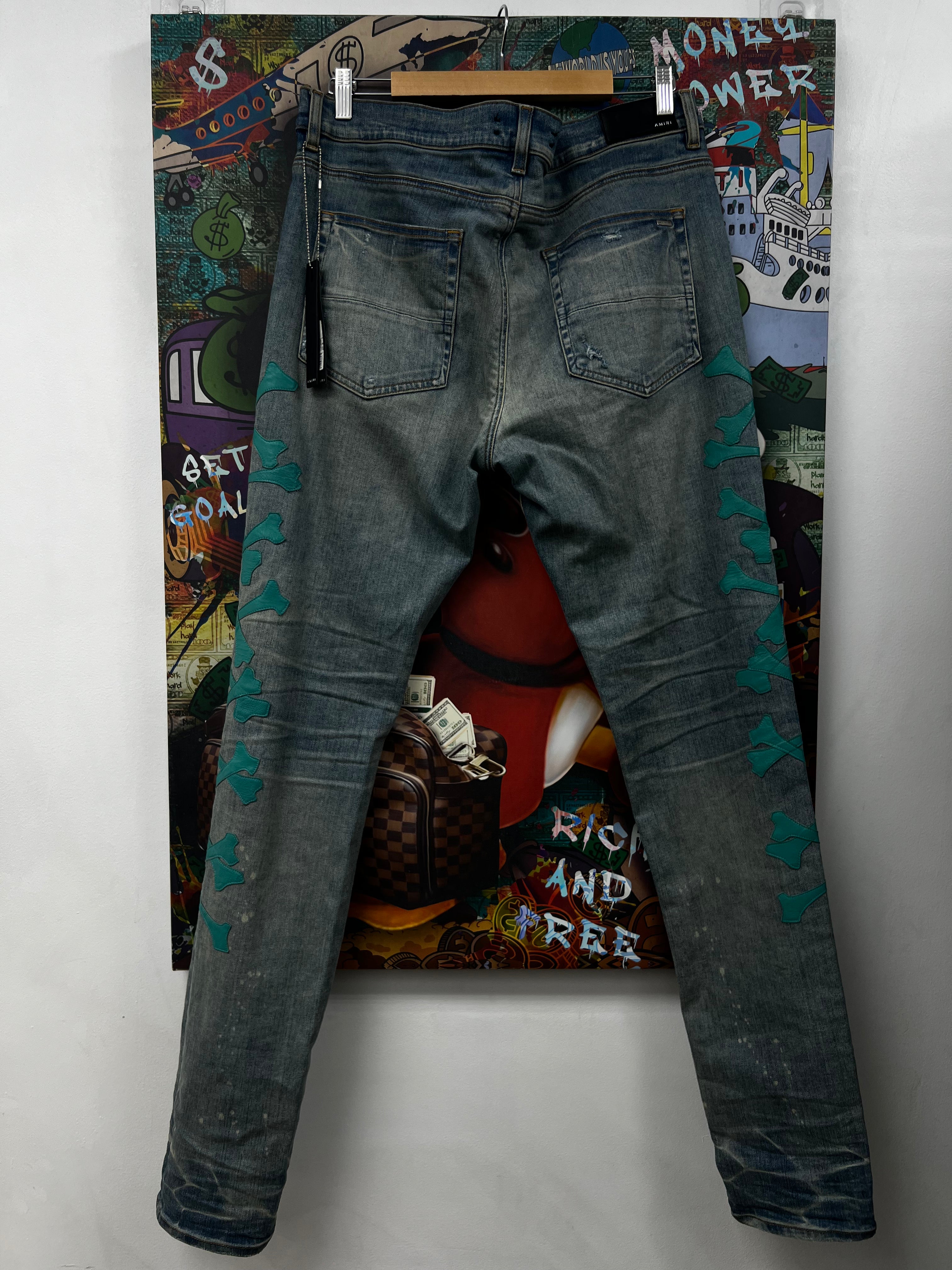 Amiri Light Wash Teal Bones Jeans